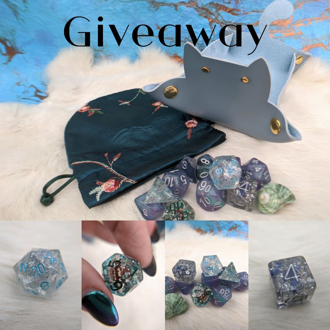 Giveaway set featuring handmade dice, a decorative pouch, and a cat-shaped accessory on a cozy background.