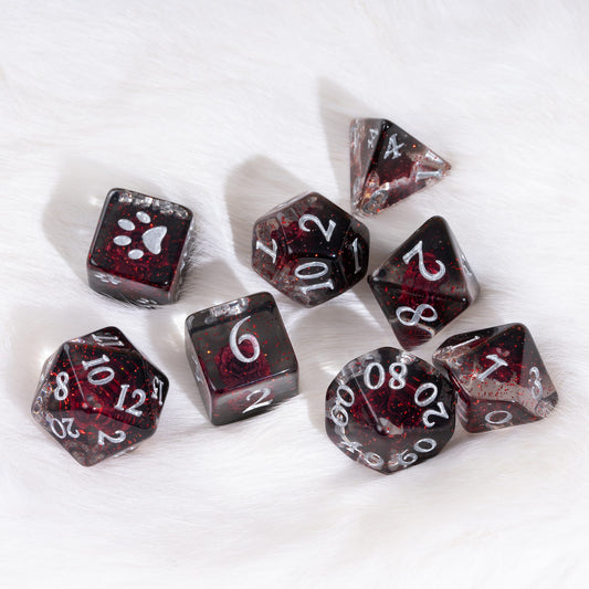 A set of translucent dark red and black polyhedral dice with white printed numbers and symbols, arranged on a white faux fur background.