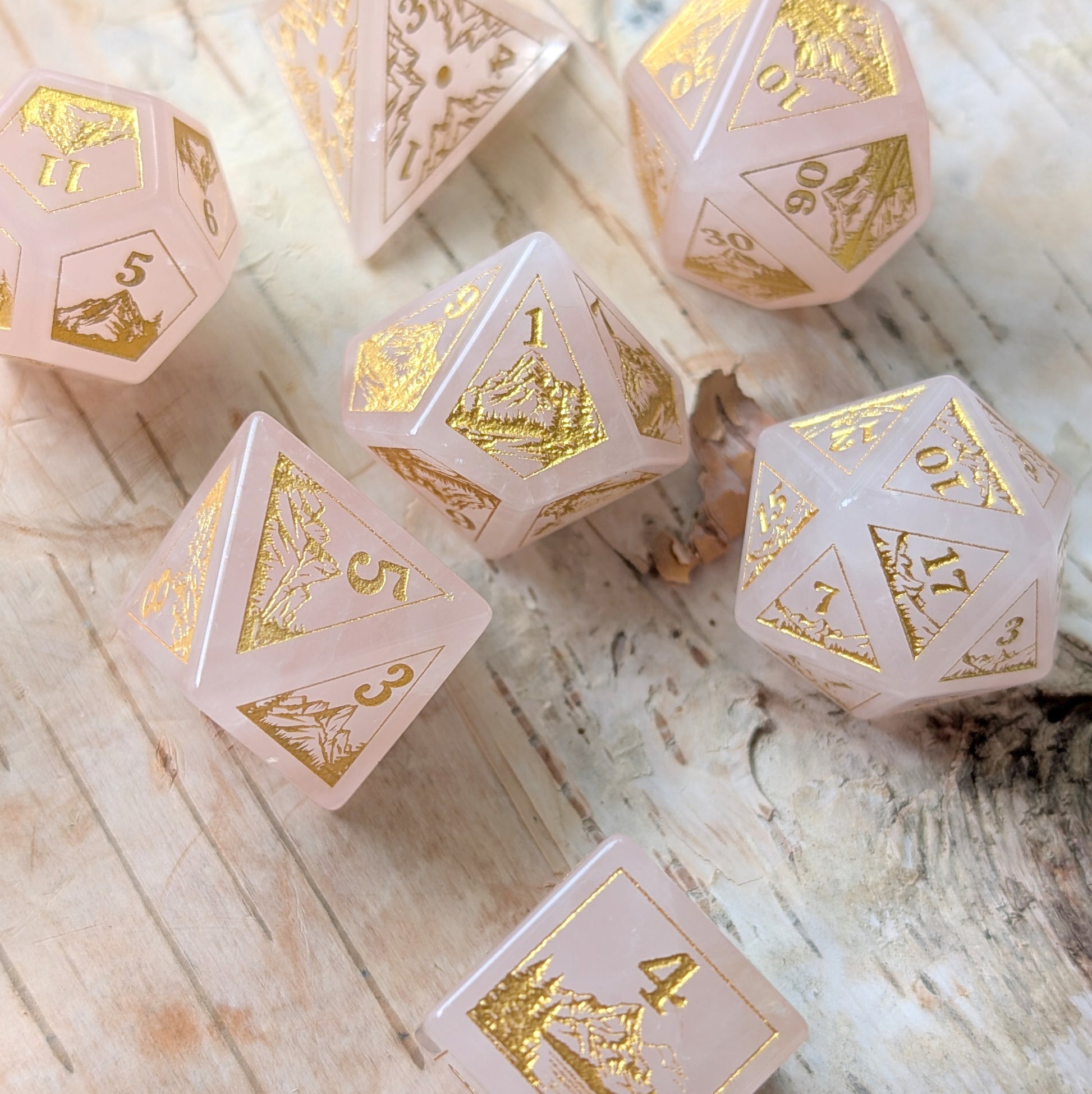 Everwild – Rose Quartz Gemstone Dice Set, Forest and Mountain Etched, TTRPG 7 Piece Dice Fennek and Finch