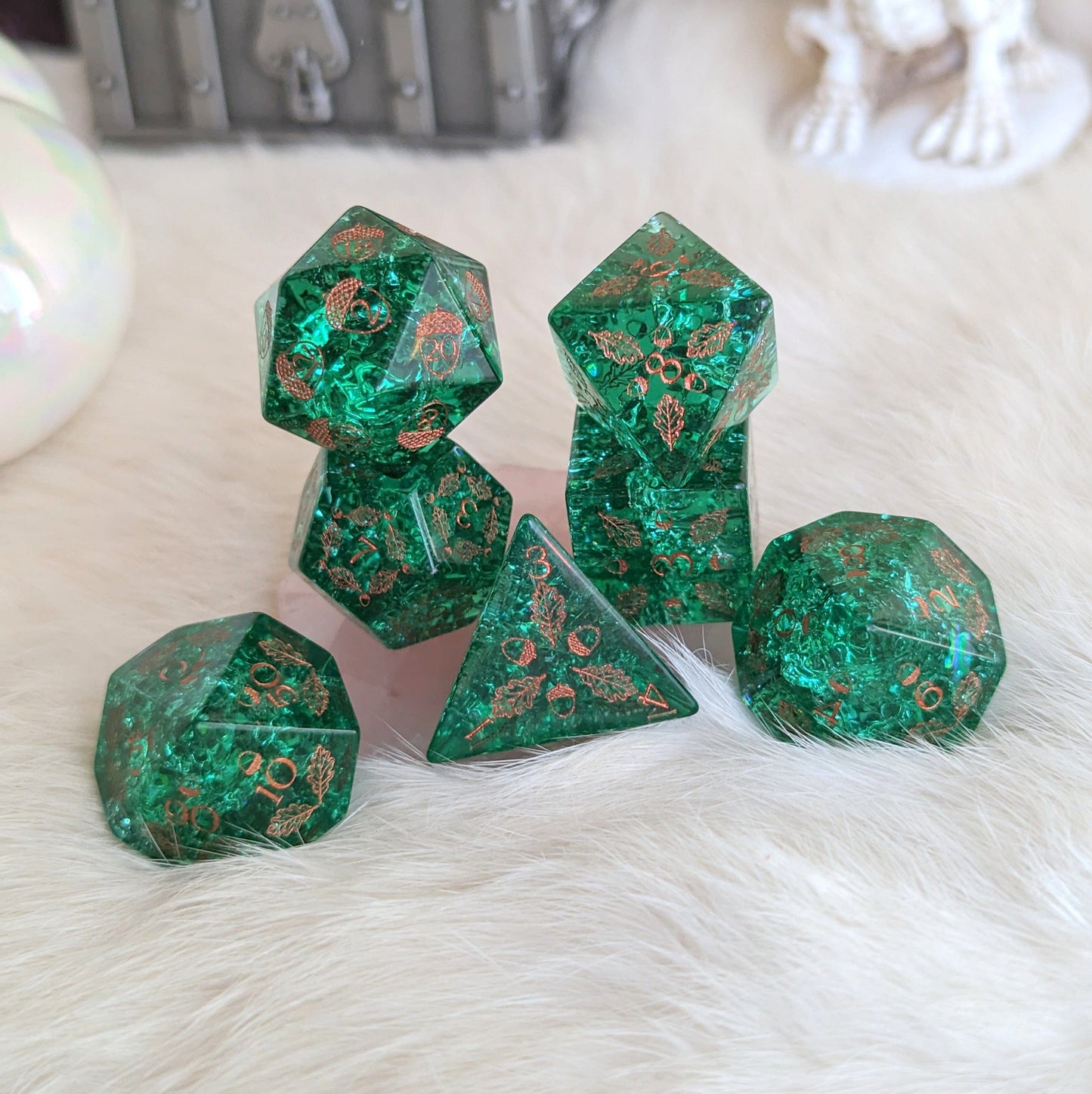 Acorn and Oak Green Lightning Glass Dice Set with intricate designs, perfect for gaming druids. Includes d20, d12, d10, d8, d6, d4.