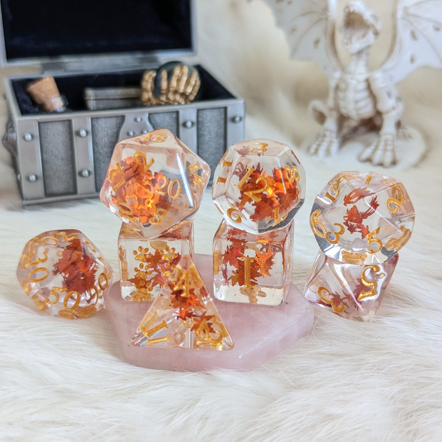 Autumn Leaf Dice Set with orange leaf glitter, designed for Dungeons and Dragons, featuring an extra D6 with paw prints, exclusive by Therin.