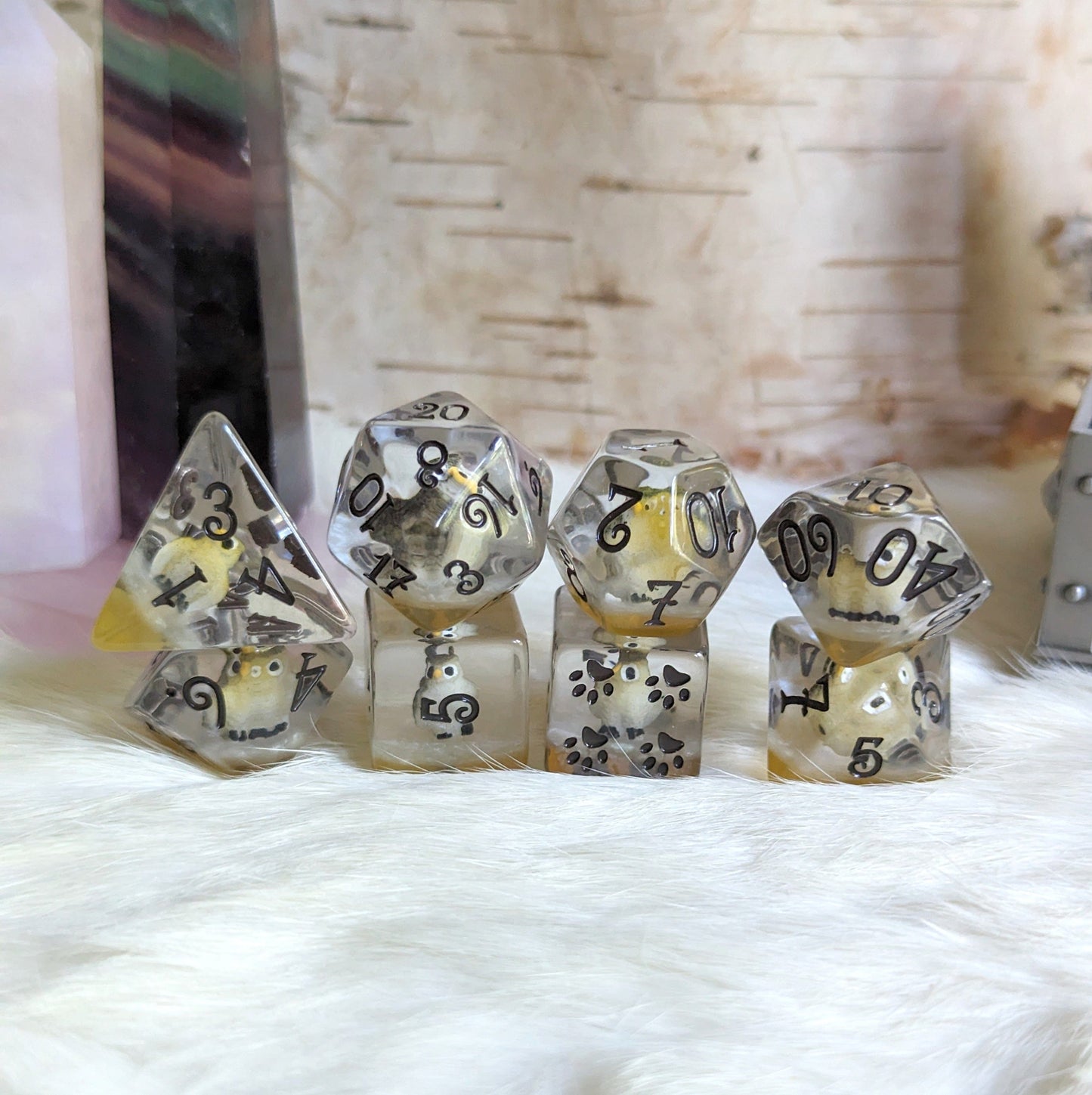 Barn Owl Dice Set featuring miniature owls in clear resin with silver and brown accents, perfect for Dungeons and Dragons.