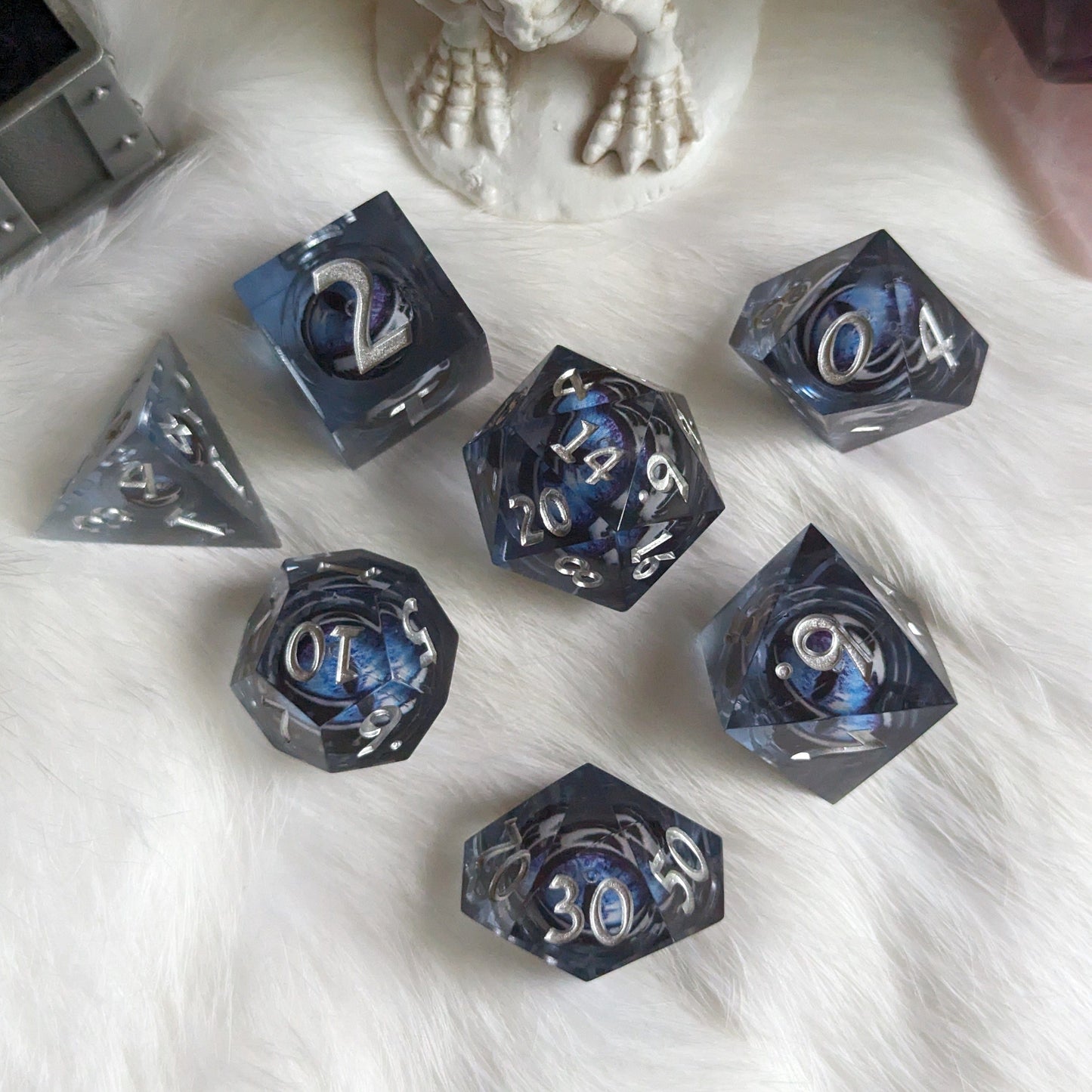 Blue and White Moving Eye Liquid Core Sharp Edge Resin DnD Dice Set Dice Sets & Games Fennek and Finch