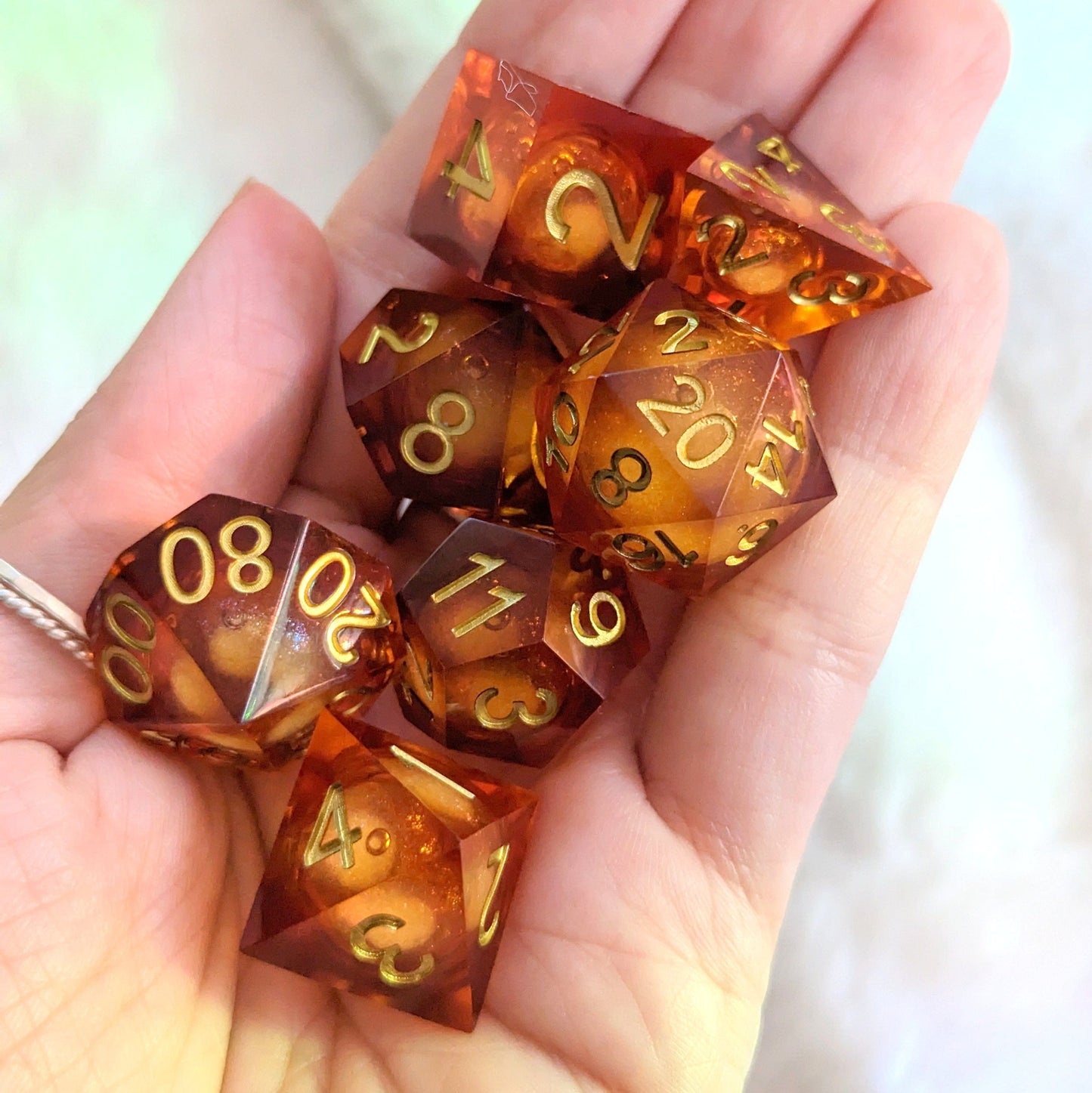 Embers Liquid Core Sharp Edge Resin DnD Dice Set