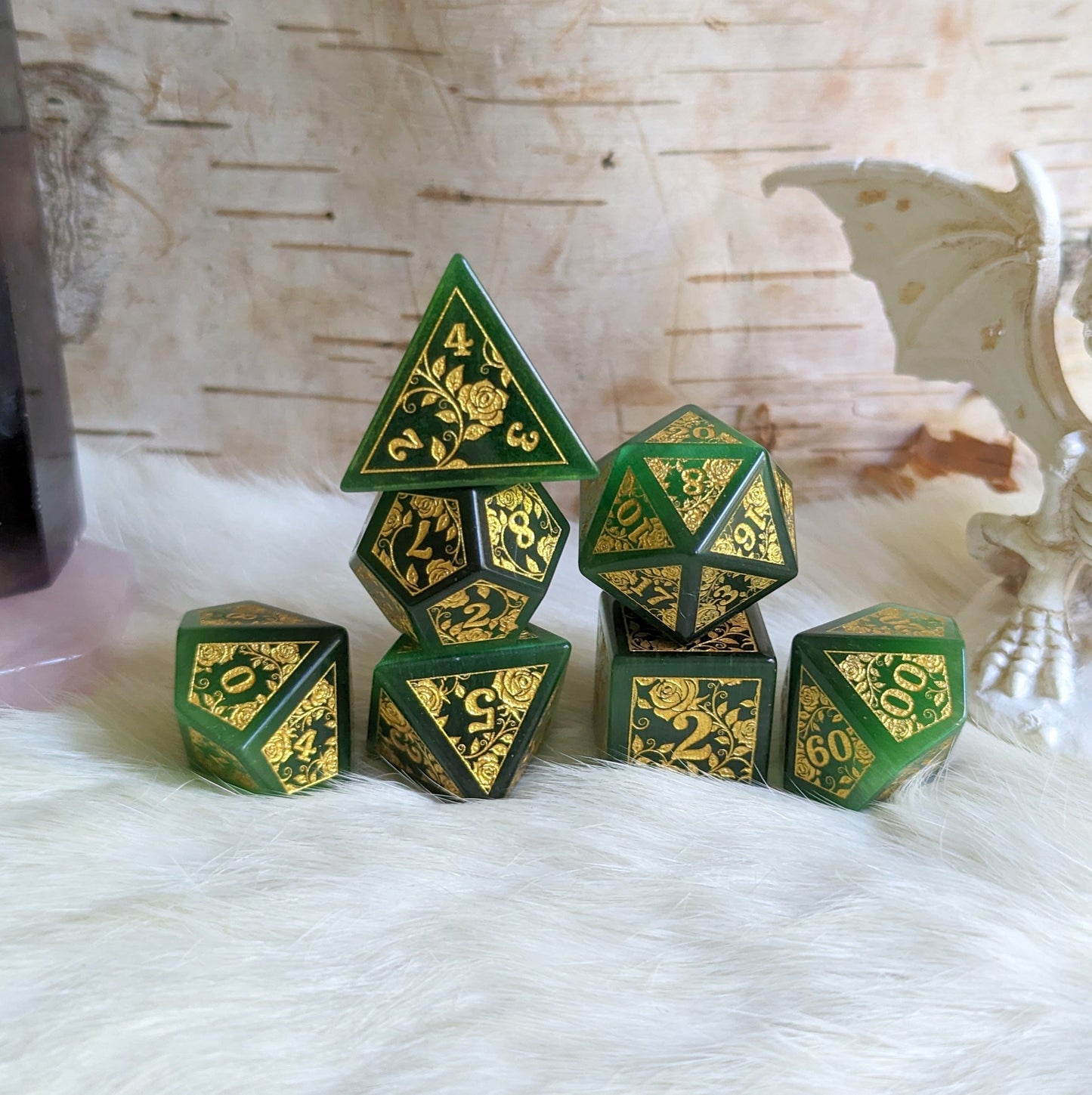Green Cats Eye Rose Dice Set with gold rose and vine designs, perfect for Dungeons & Dragons gaming.