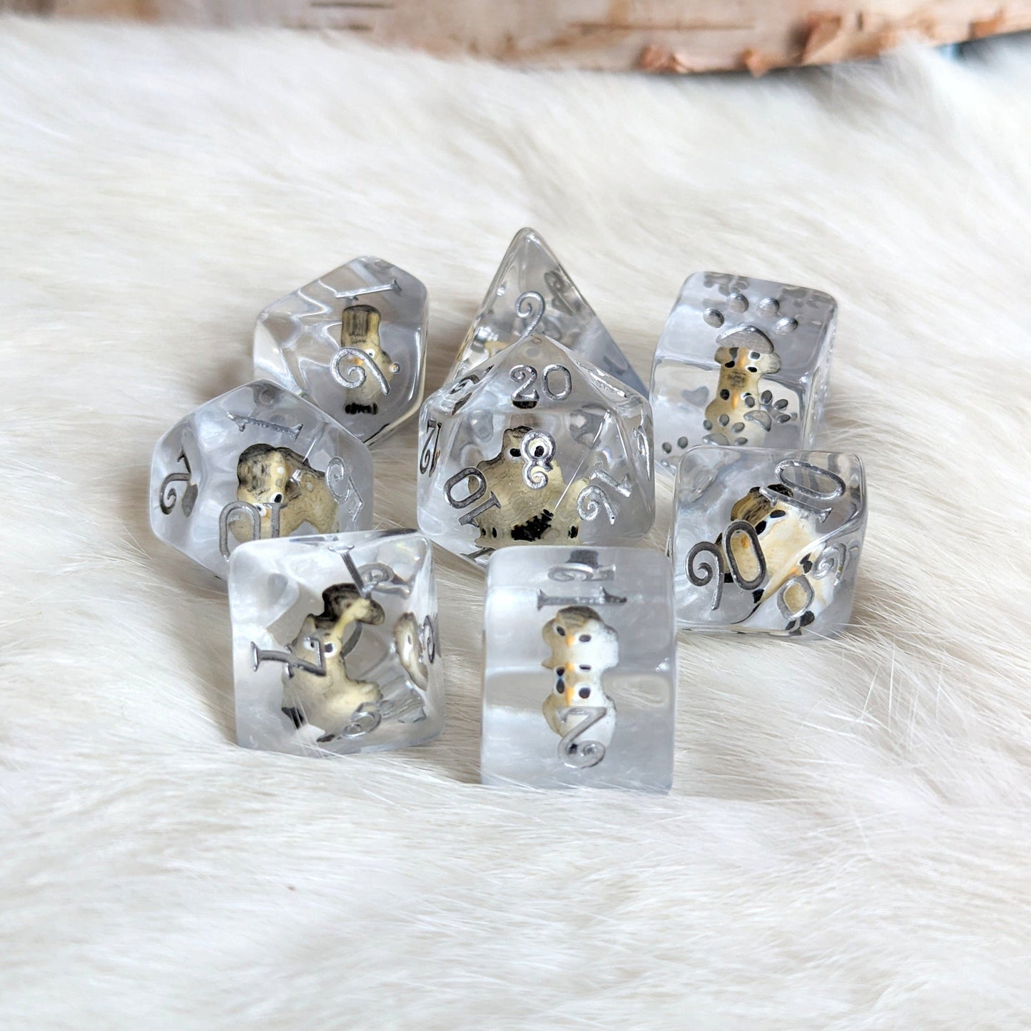 Horned Owl Dice Set with miniature owls in clear resin, featuring silver and blue layers, designed for TTRPGs and Dungeons & Dragons.