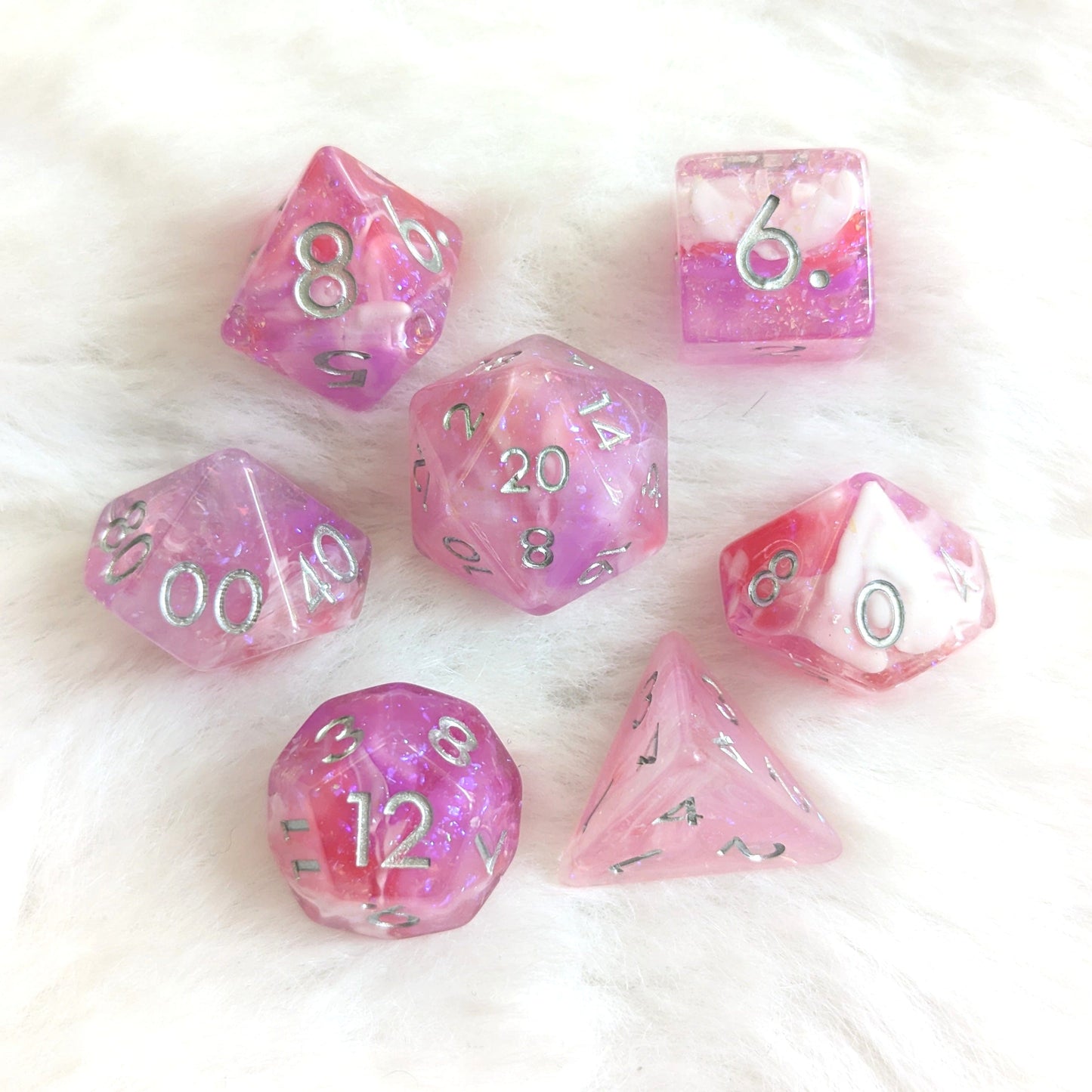 Lover's Enchantment Dice Set in purple, pink, and red glitter, perfect for TTRPG like Dungeons and Dragons.