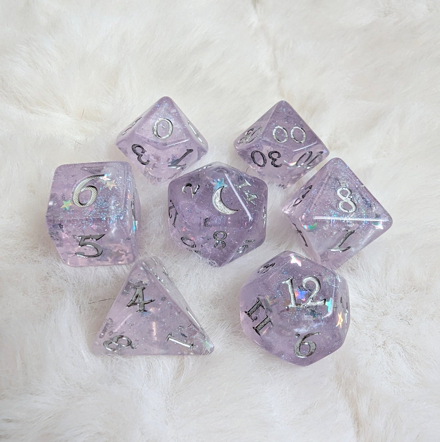 Moonbeam Dice Set in light purple with silver foil and star glitter, featuring crescent moon D20 design for TTRPG games.