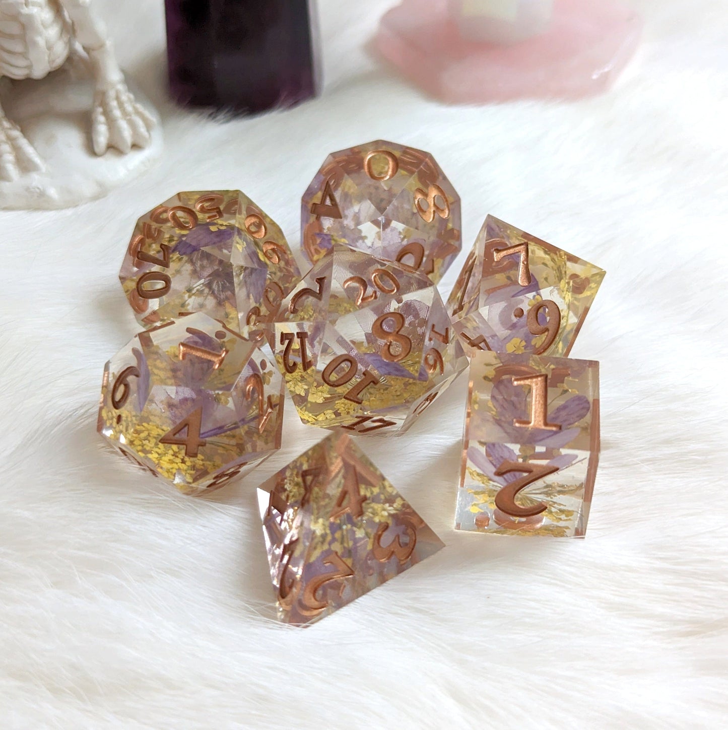 Purple butterfly and yellow flower 7-piece dice set with copper numbers, featuring dried flowers and faux butterfly inside.