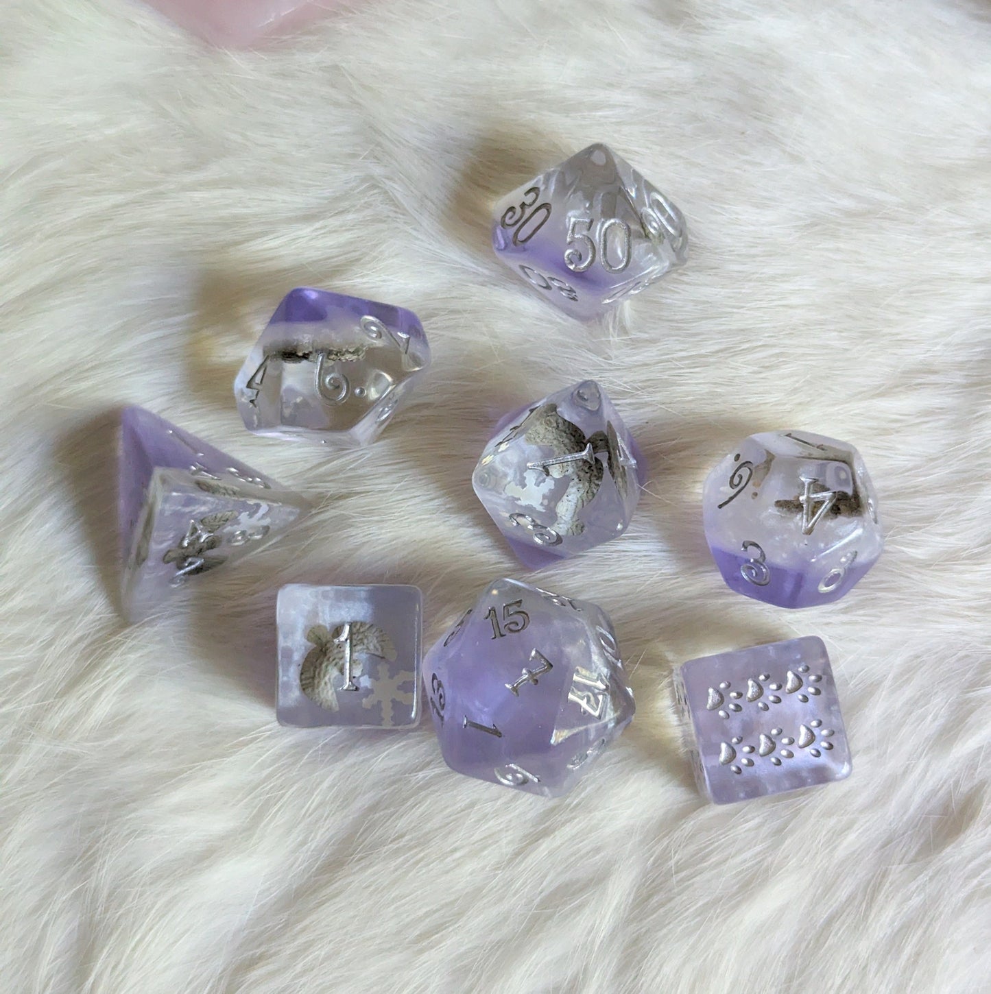 Snowy Owl Dice Set, 8 piece polyhedral dice with miniature owls in clear resin, silver and purple theme for TTRPGs.
