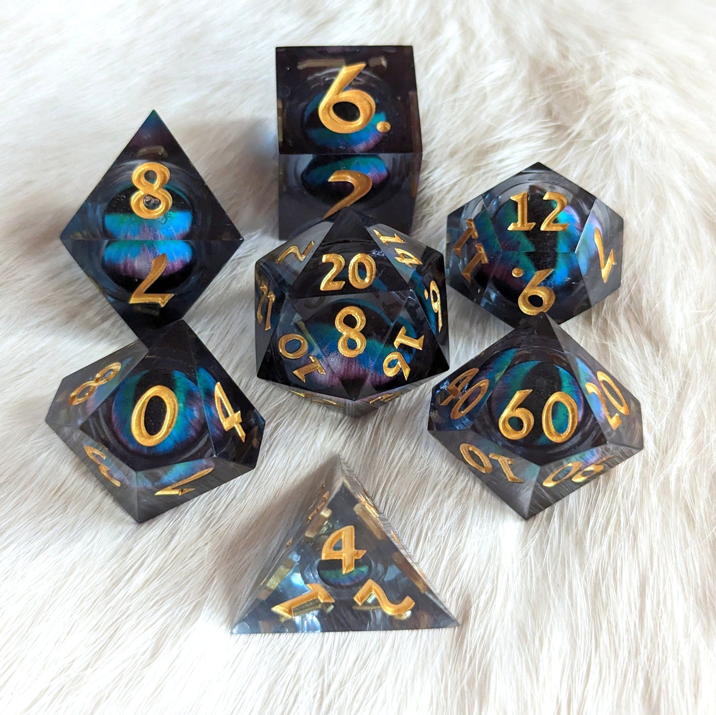 Teal Moving Eye Liquid Core Sharp Edge Resin DnD Dice Set