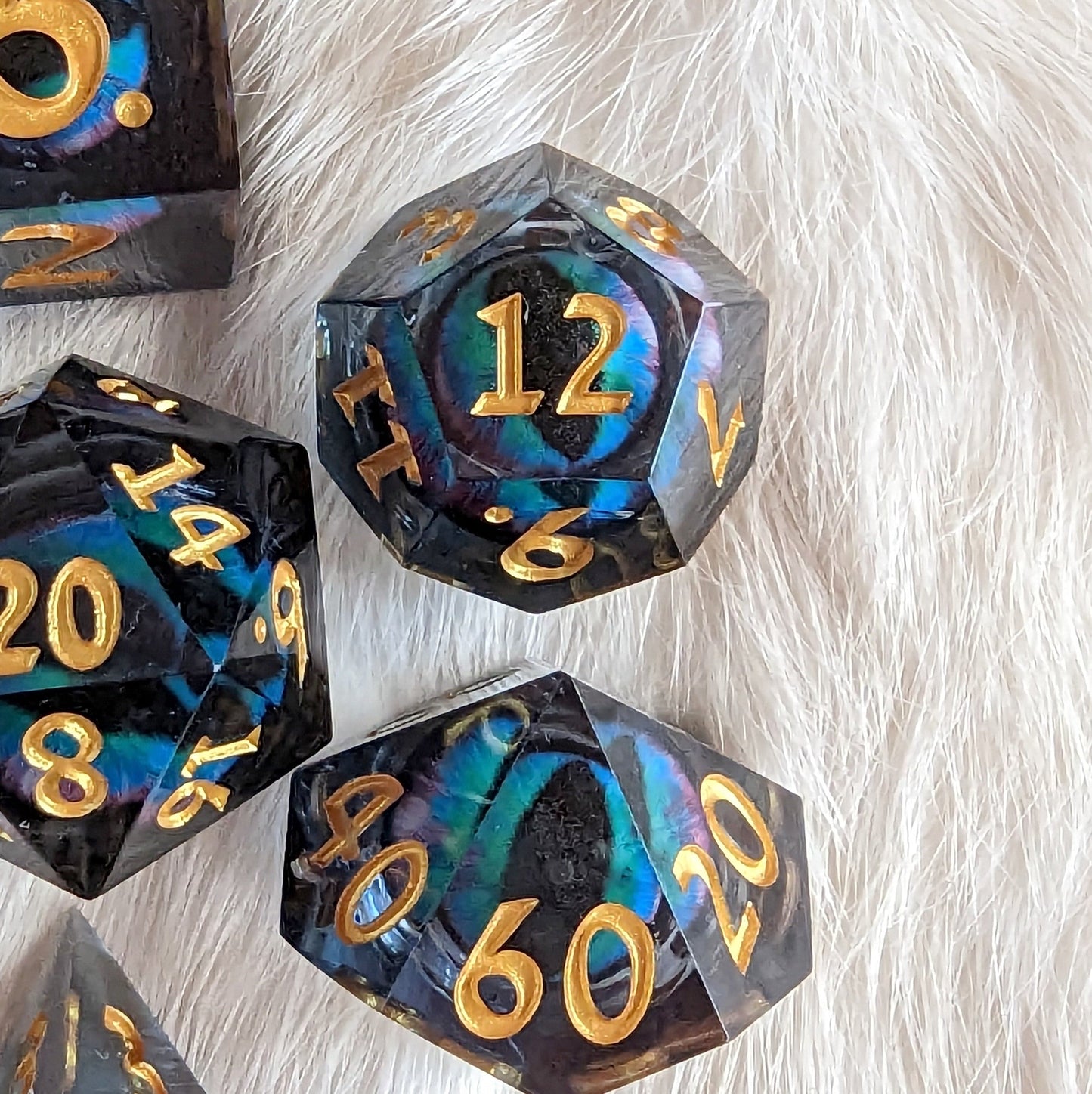 Teal Moving Eye Liquid Core Sharp Edge Resin DnD Dice Set
