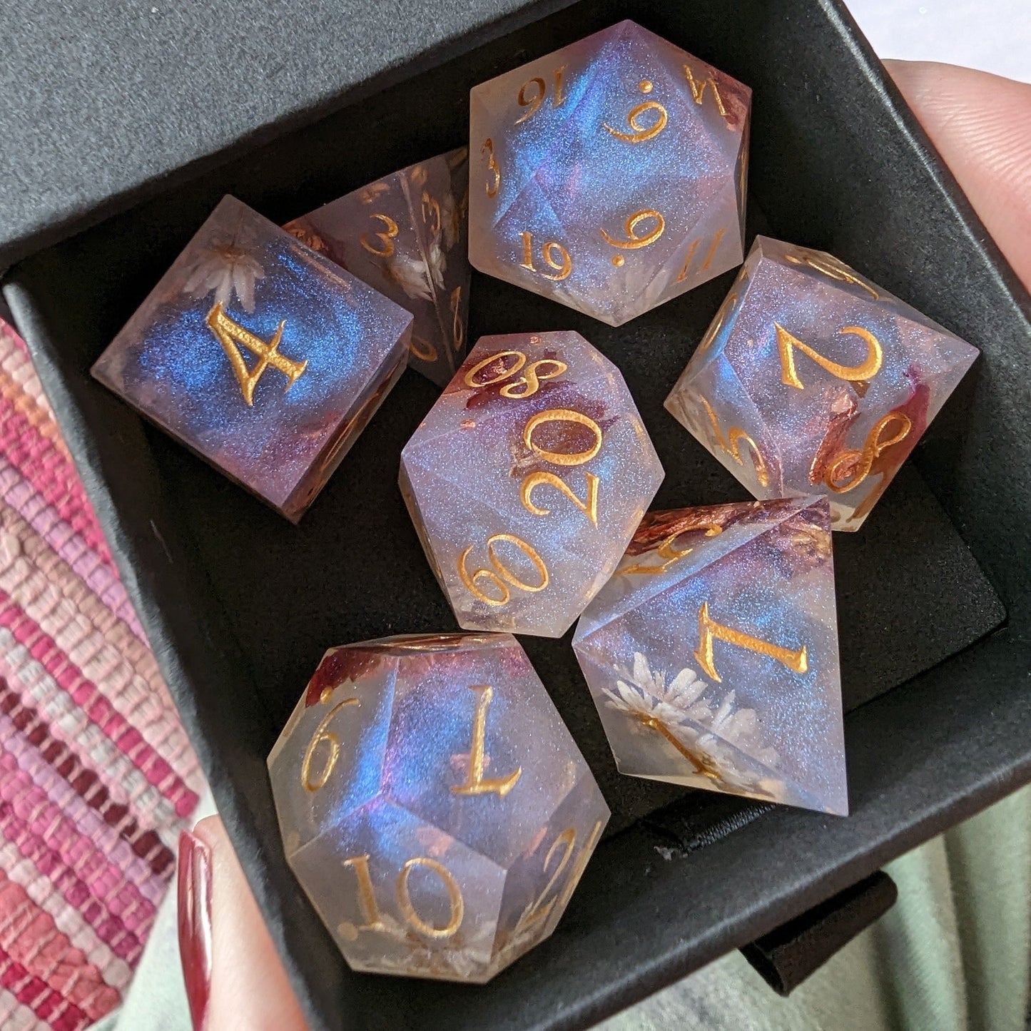 Sharp edge dice set with daisy flowers and rose petals in purple blue shimmer for Dungeons and Dragons, by Fennek and Finch.