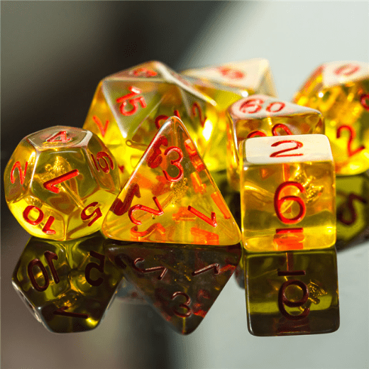 Polyhedral dice set with red numbers on a reflective surface, perfect for tabletop games like Dungeons and Dragons.