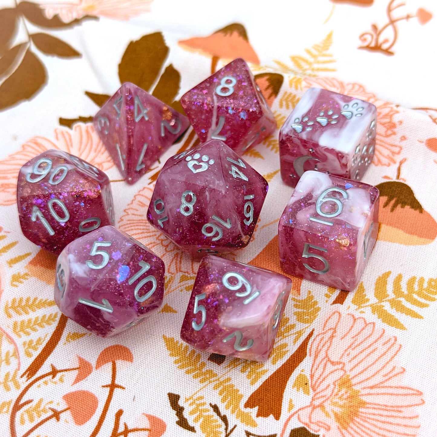 Berry Wine 8 Piece Dice Set. Clear Burgundy and White Marble, with Glitter and Foil Dice sets Fennek and Finch