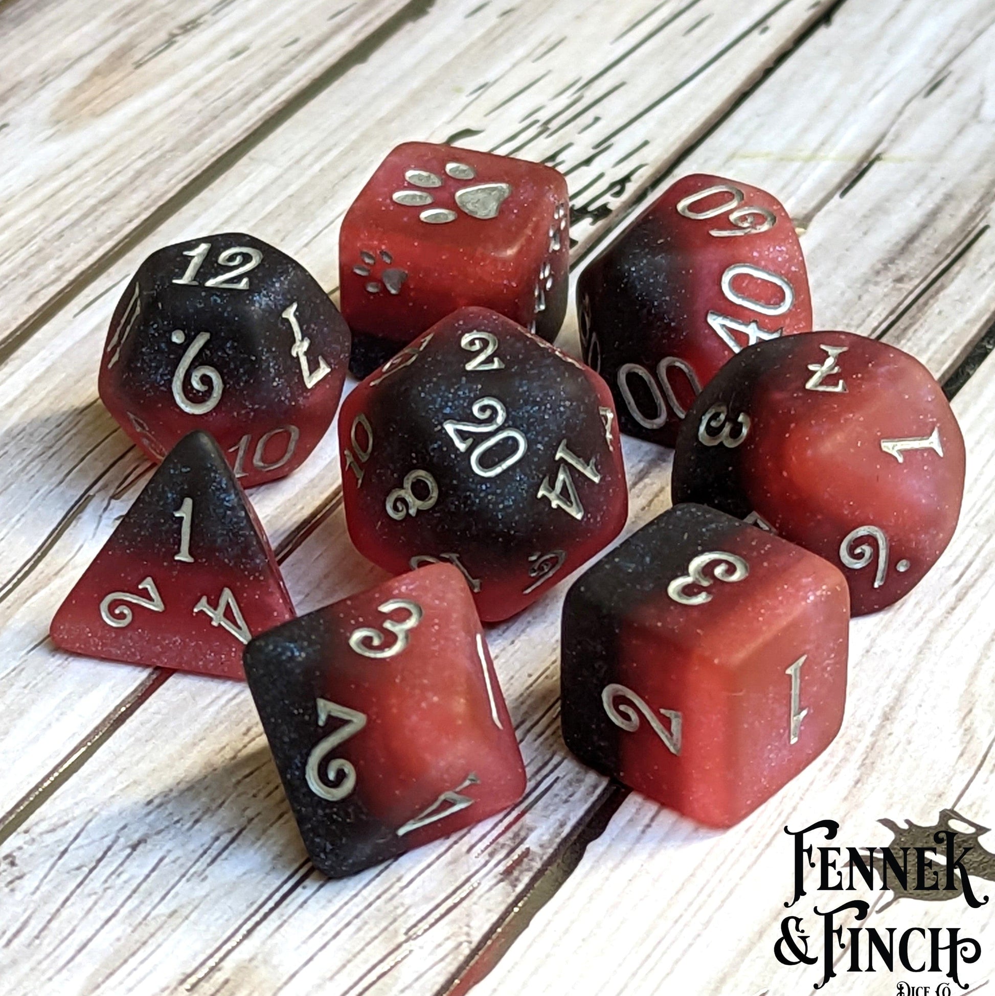 Blood and Pomegranate 8 Piece Dice Set. Red to black ombre frosted Dice sets Fennek and Finch
