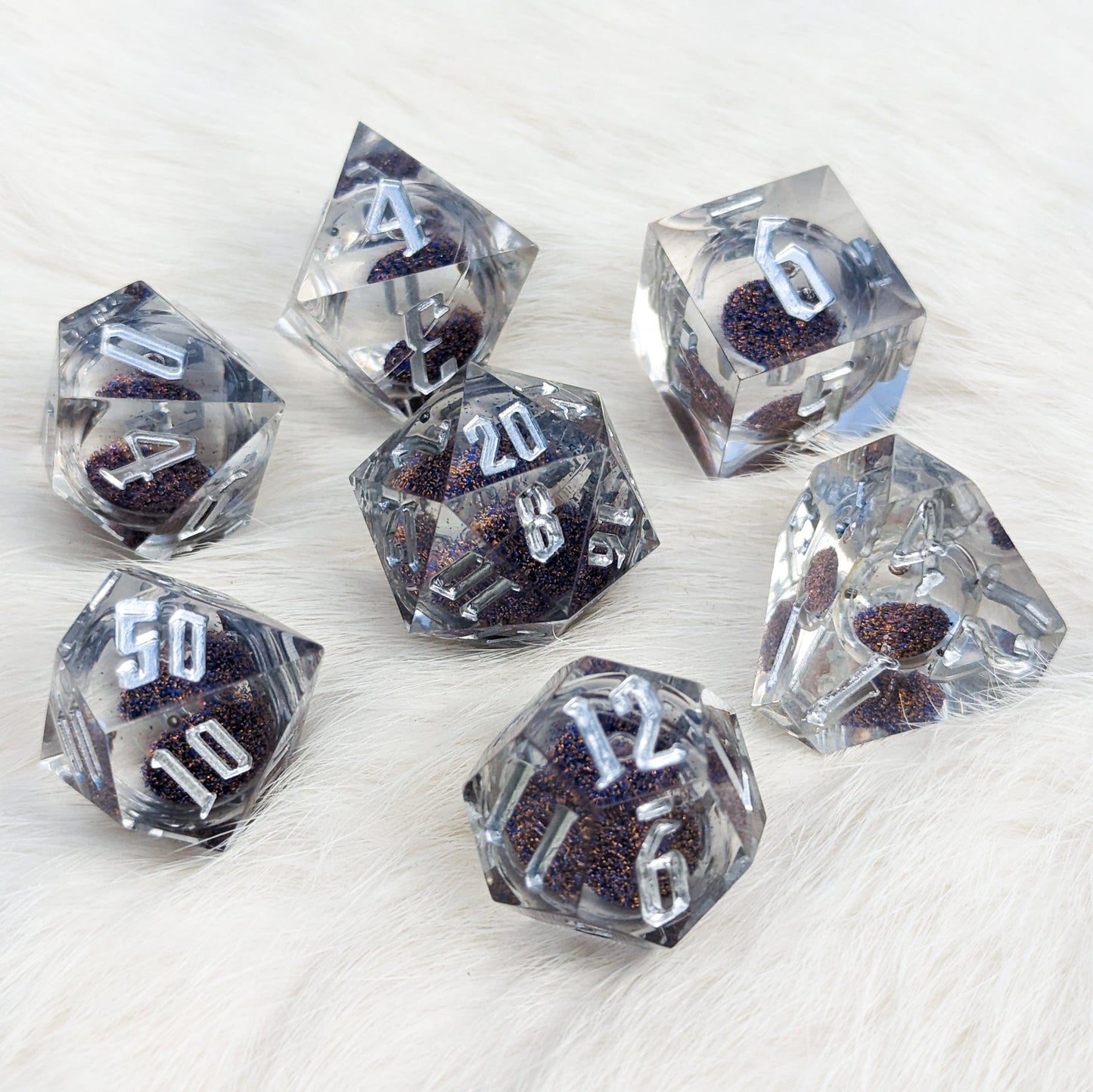 Blue and Gold Clear Liquid Core Sharp Edge Resin DnD Dice Set Dice Sets & Games Fennek and Finch