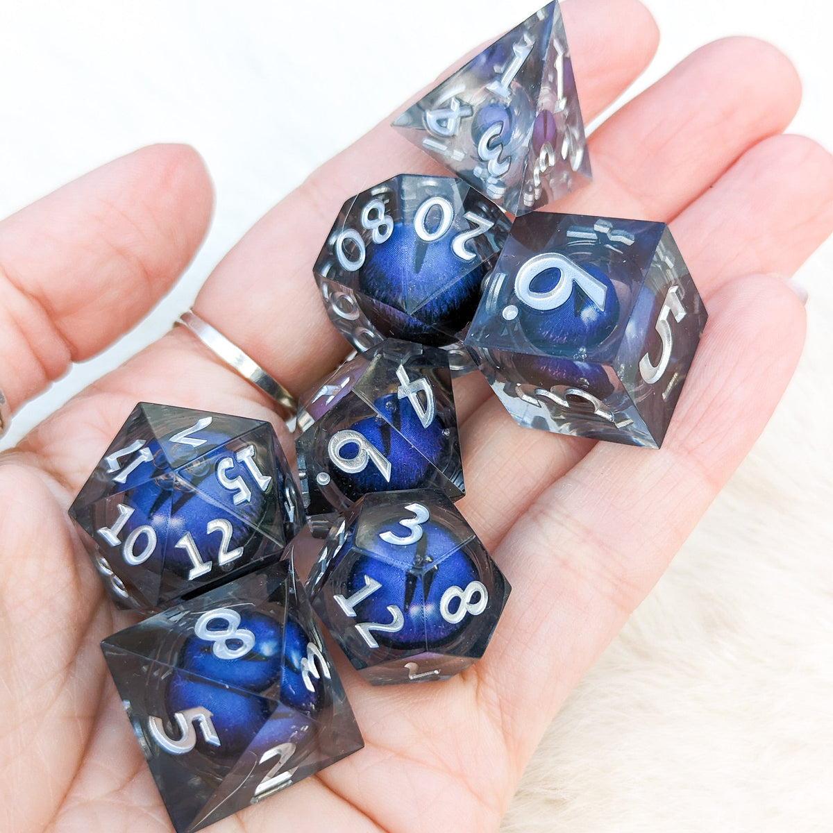 Blue Moving Eye Liquid Core Sharp Edge Resin DnD Dice Set Dice Sets & Games Fennek and Finch