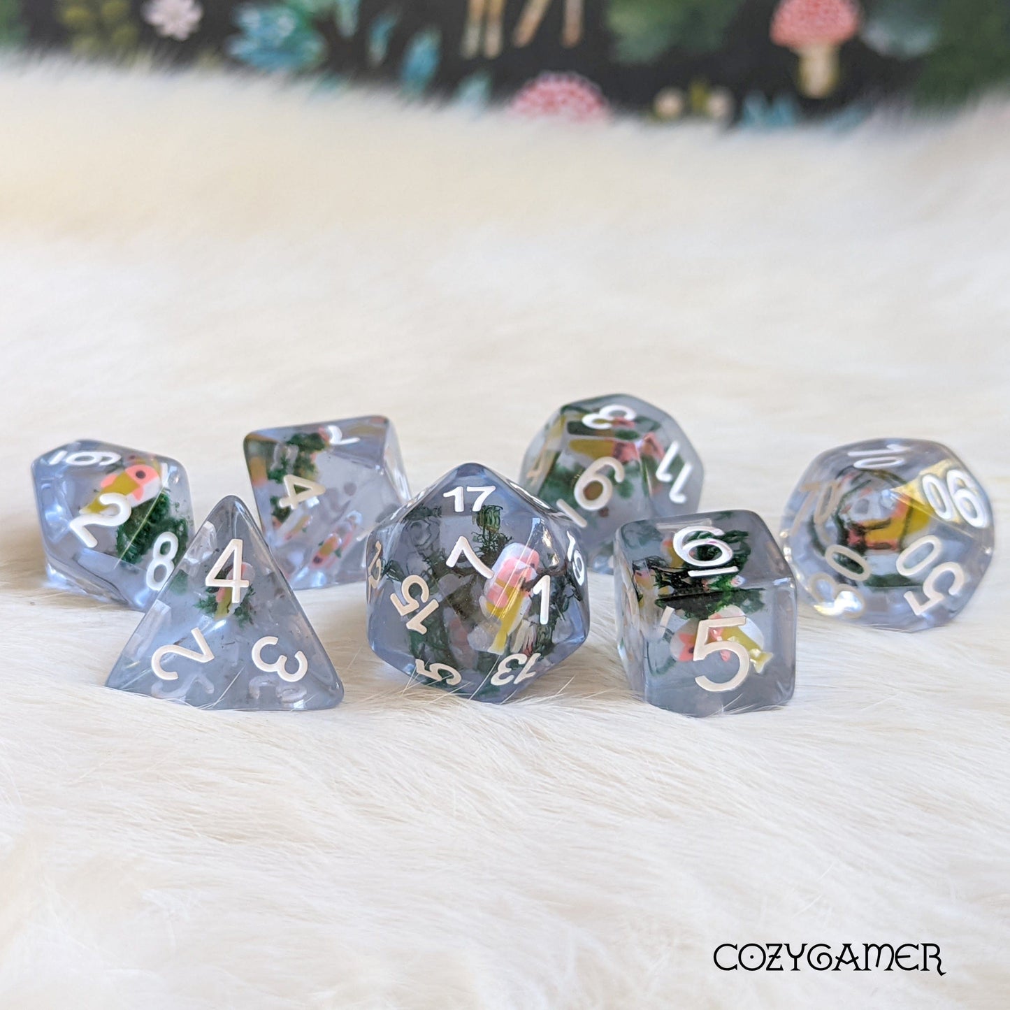 Blue Swimming Fish DnD Dice Set with clear resin, featuring tiny fish and dried moss for tabletop games like Dungeons and Dragons.