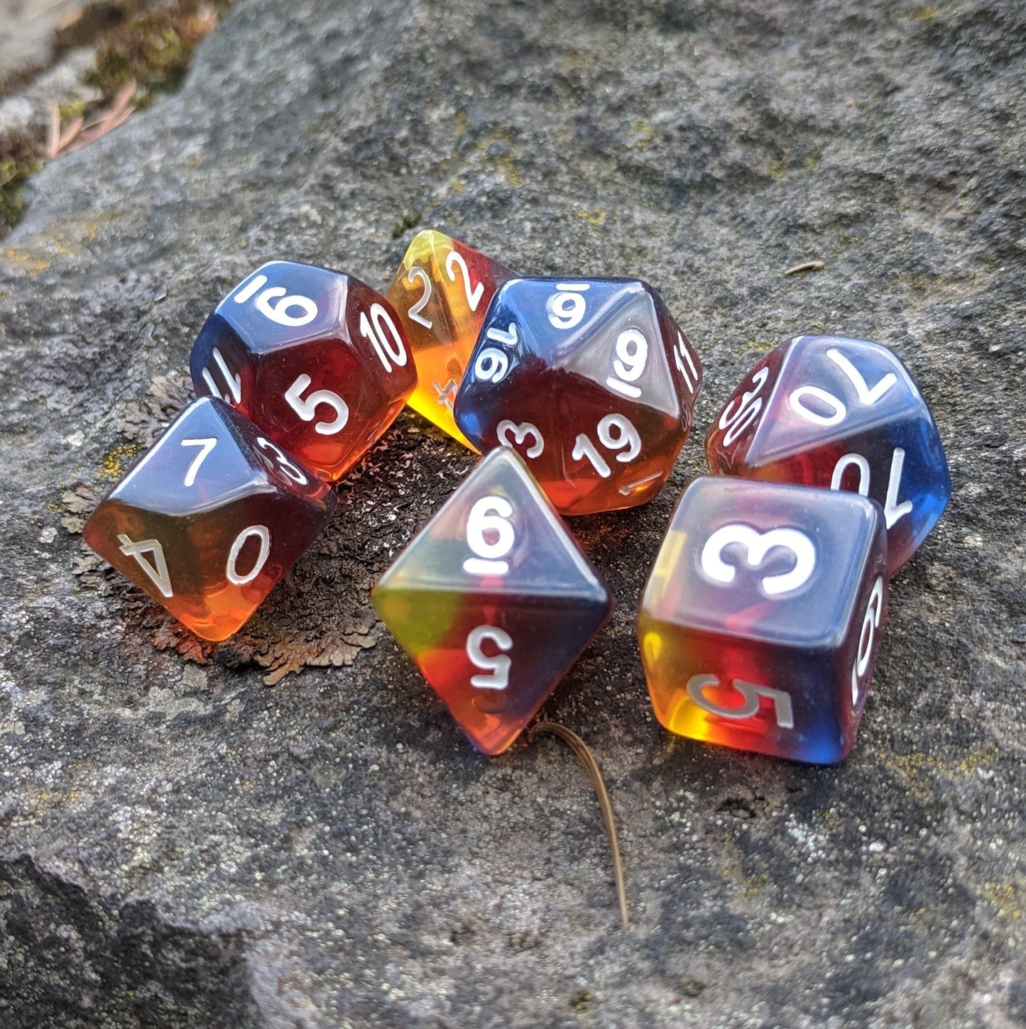 Burning Cloud Dice Set, red, yellow, and blue layered dice set by HD - CozyGamer