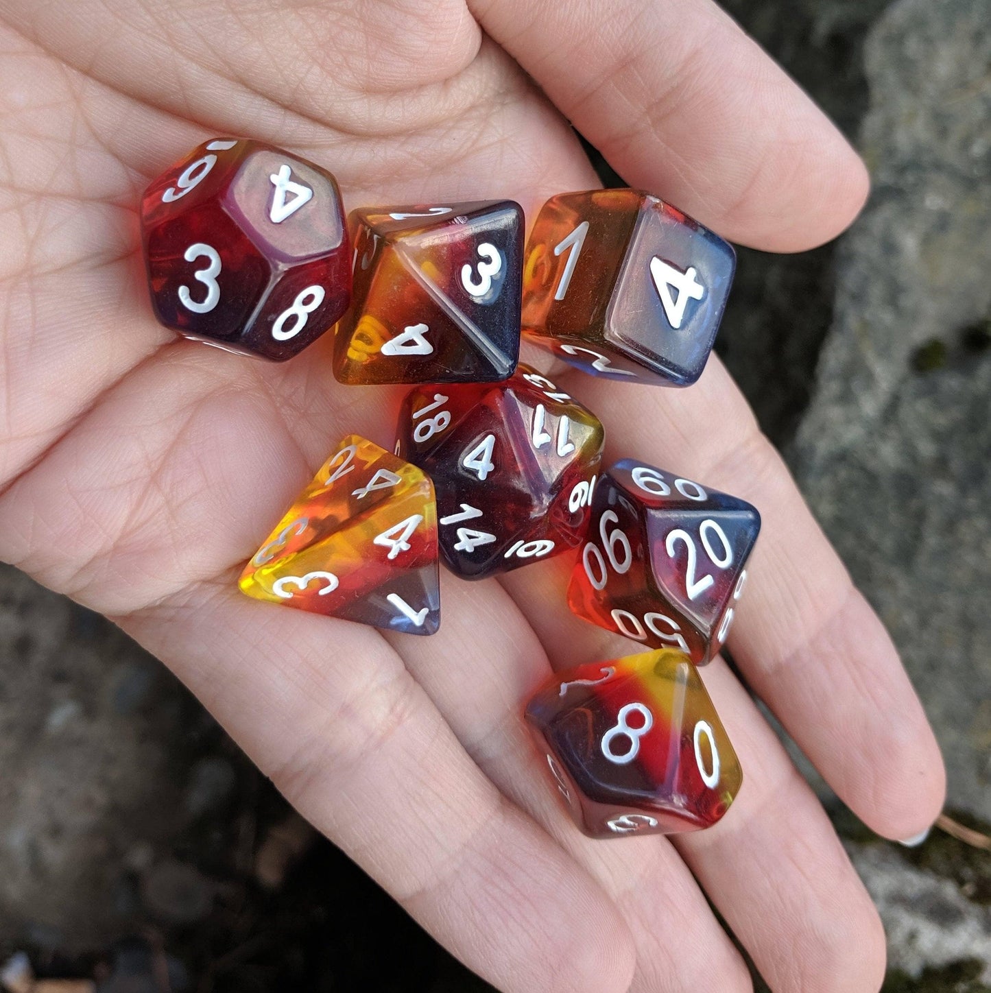 Burning Cloud Dice Set, red, yellow, and blue layered dice set by HD - CozyGamer