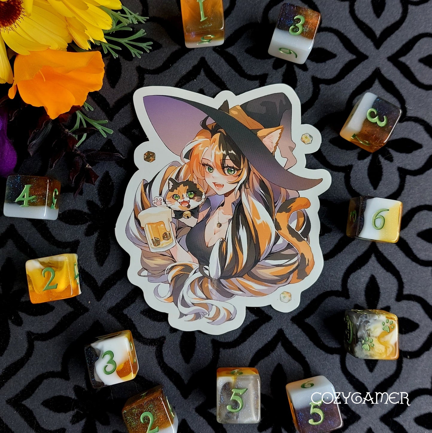 Calico Cat Witch Brewster Sticker with colorful dice and flowers, inspired by calico cat dice sets from Cozy Gamer.
