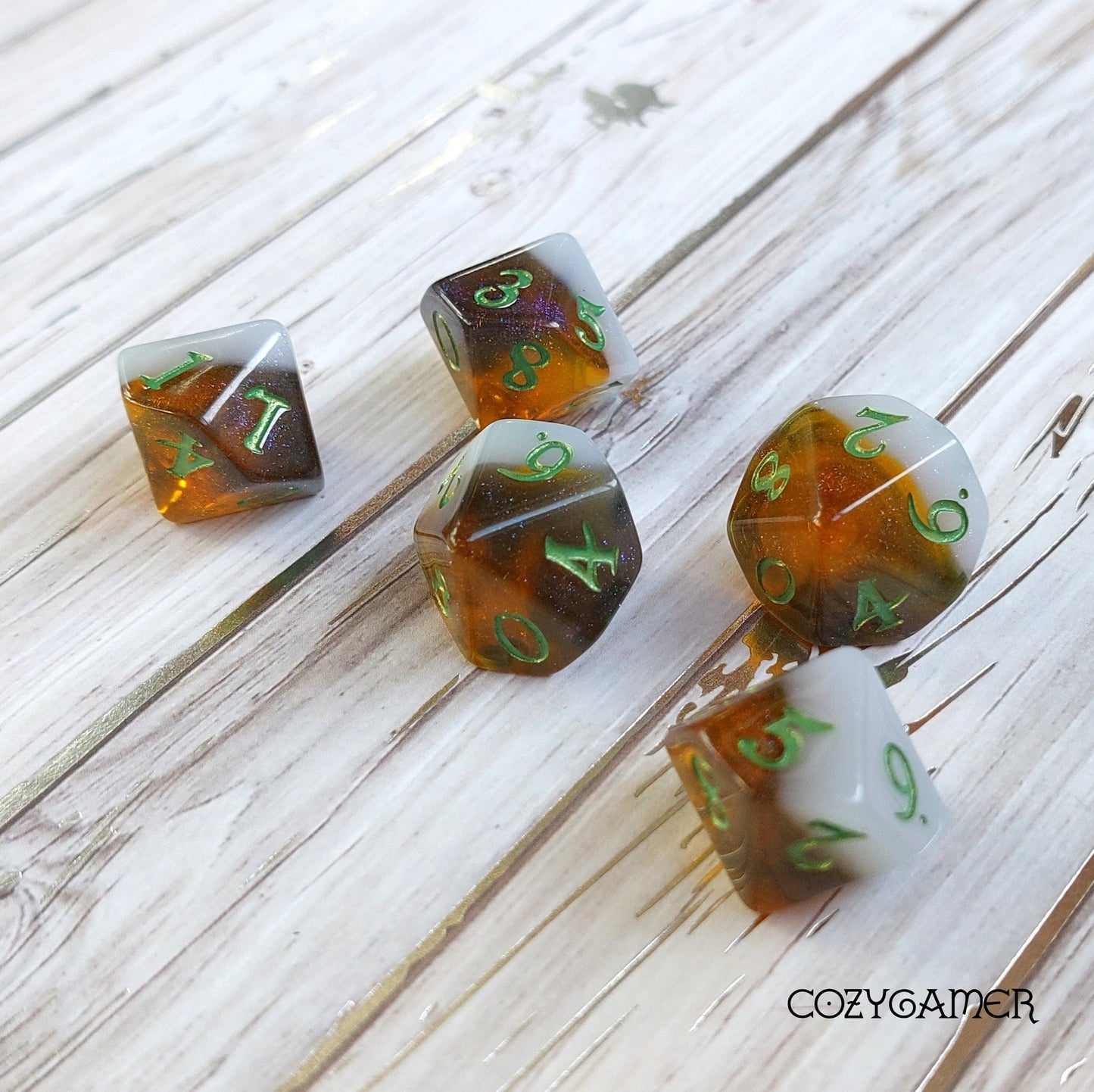 Calico Hazy IPA Dice Set with green numbers on a wooden surface, featuring a unique beer-themed color design.