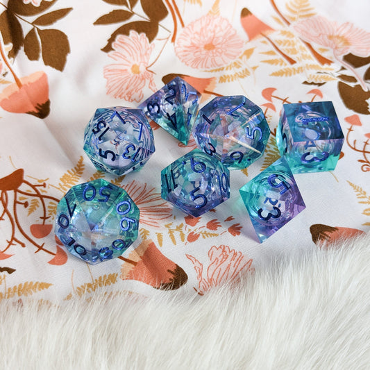 Cyan and purple Liquid Core Sharp Edge Resin DnD Dice Set Dice Sets & Games Fennek and Finch