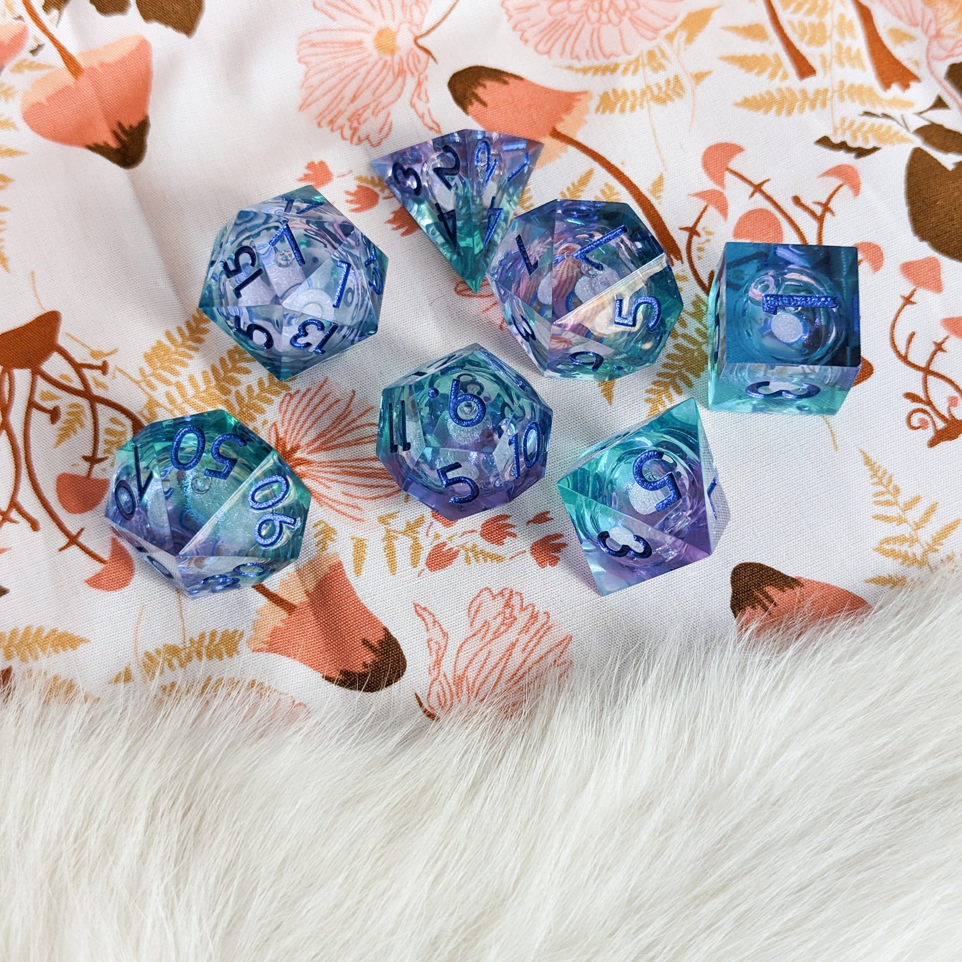 Cyan and purple Liquid Core Sharp Edge Resin DnD Dice Set Dice Sets & Games Fennek and Finch