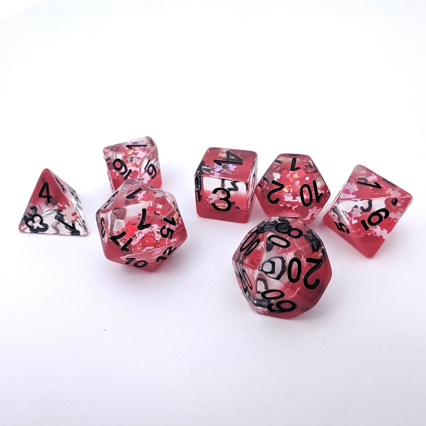 Deadly Puzzle Dice Set – 7 - Piece Red Translucent Puzzle Piece Glitter DnD Dice - Fennek and Finch