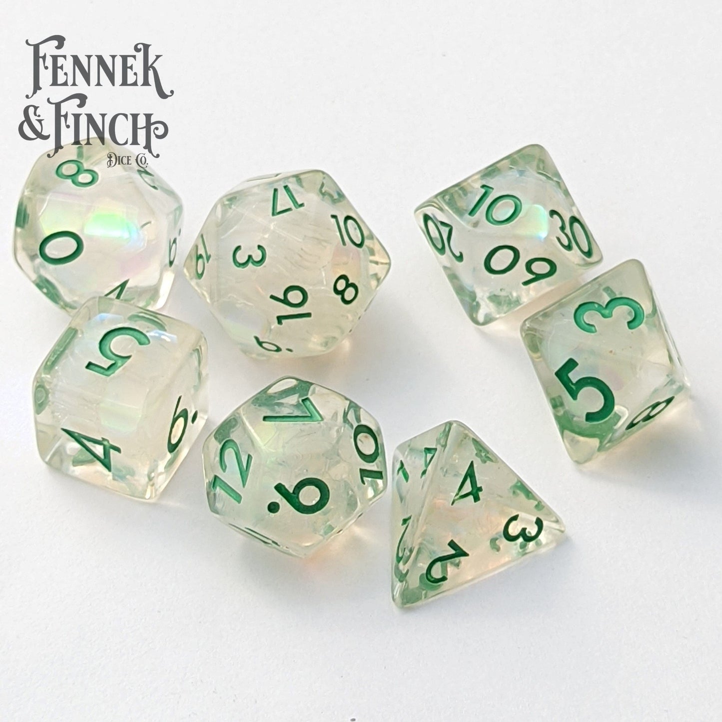 Dewy Glint Dice Set. Clear Resin with Rainbow Glitter Dice Sets & Games Fennek and Finch
