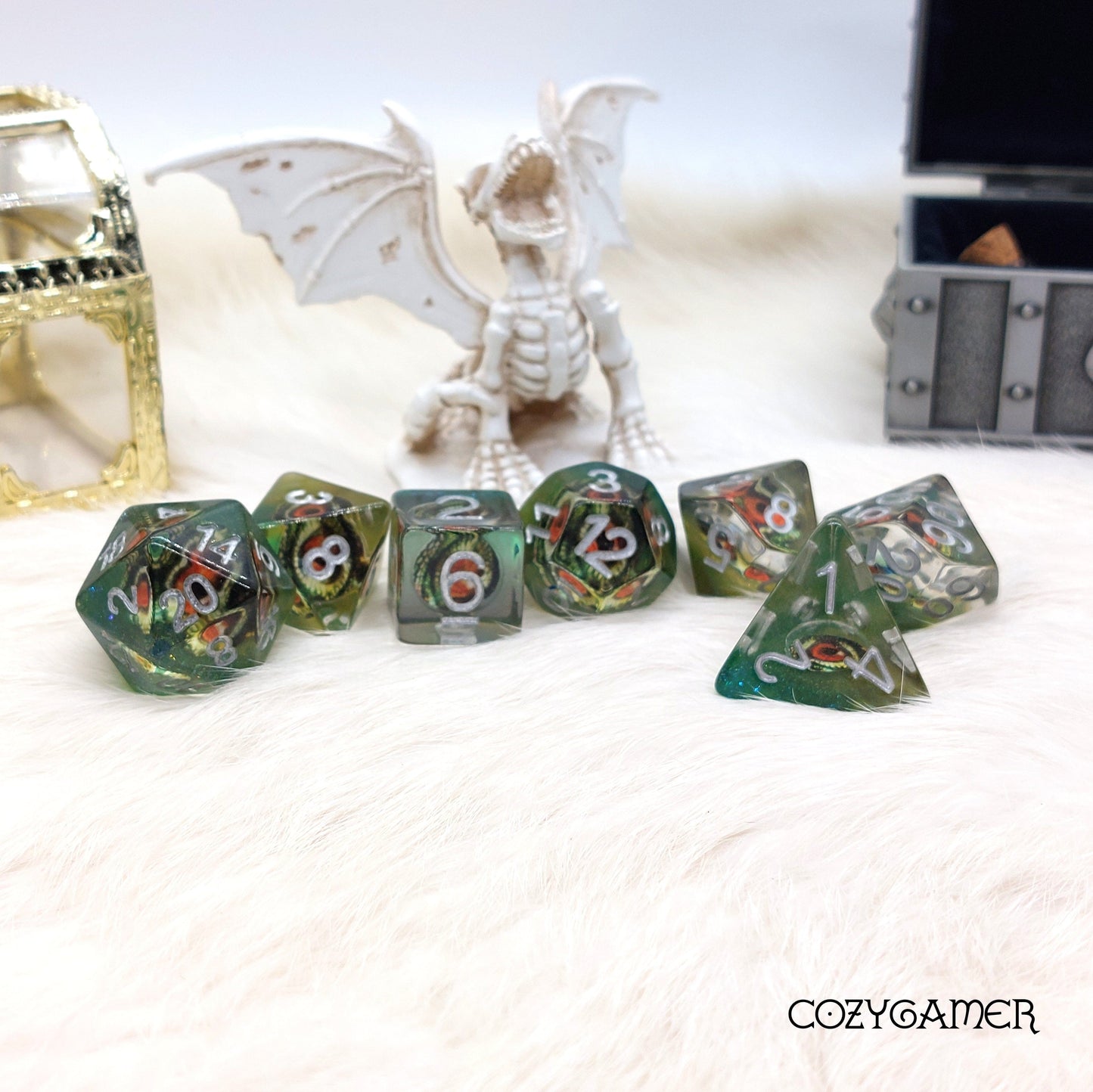 Dragon Eye Dice Set for Dungeons & Dragons with Evil Eyeball Design and Polyhedral Shapes, Displayed with Miniature Dragon Figurine