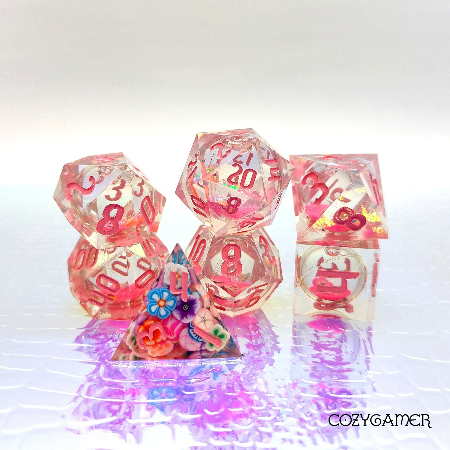 Falling Blossom liquid core dice set with pink glitter and clay flowers, perfect for DnD games.