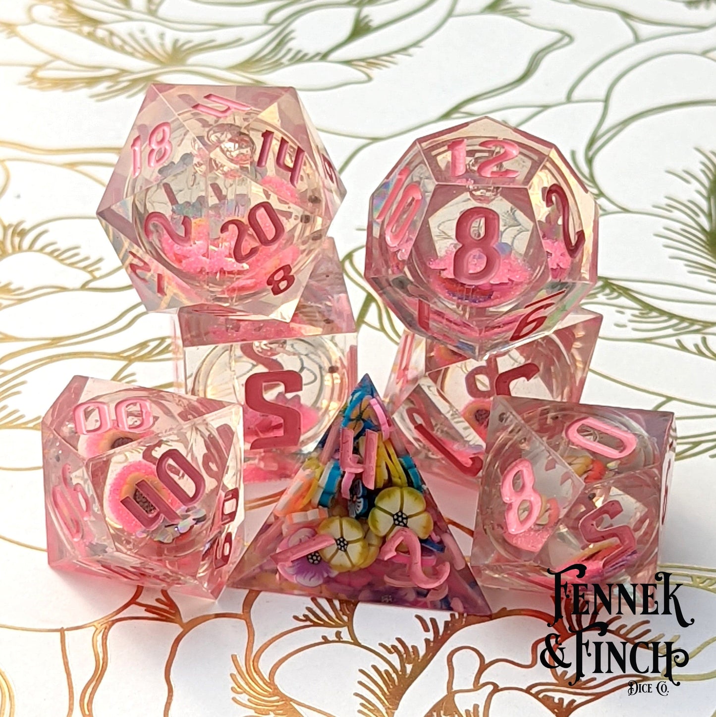 Falling Blossom liquid core dice set with pink glitter and flowers, designed for Dungeons and Dragons.
