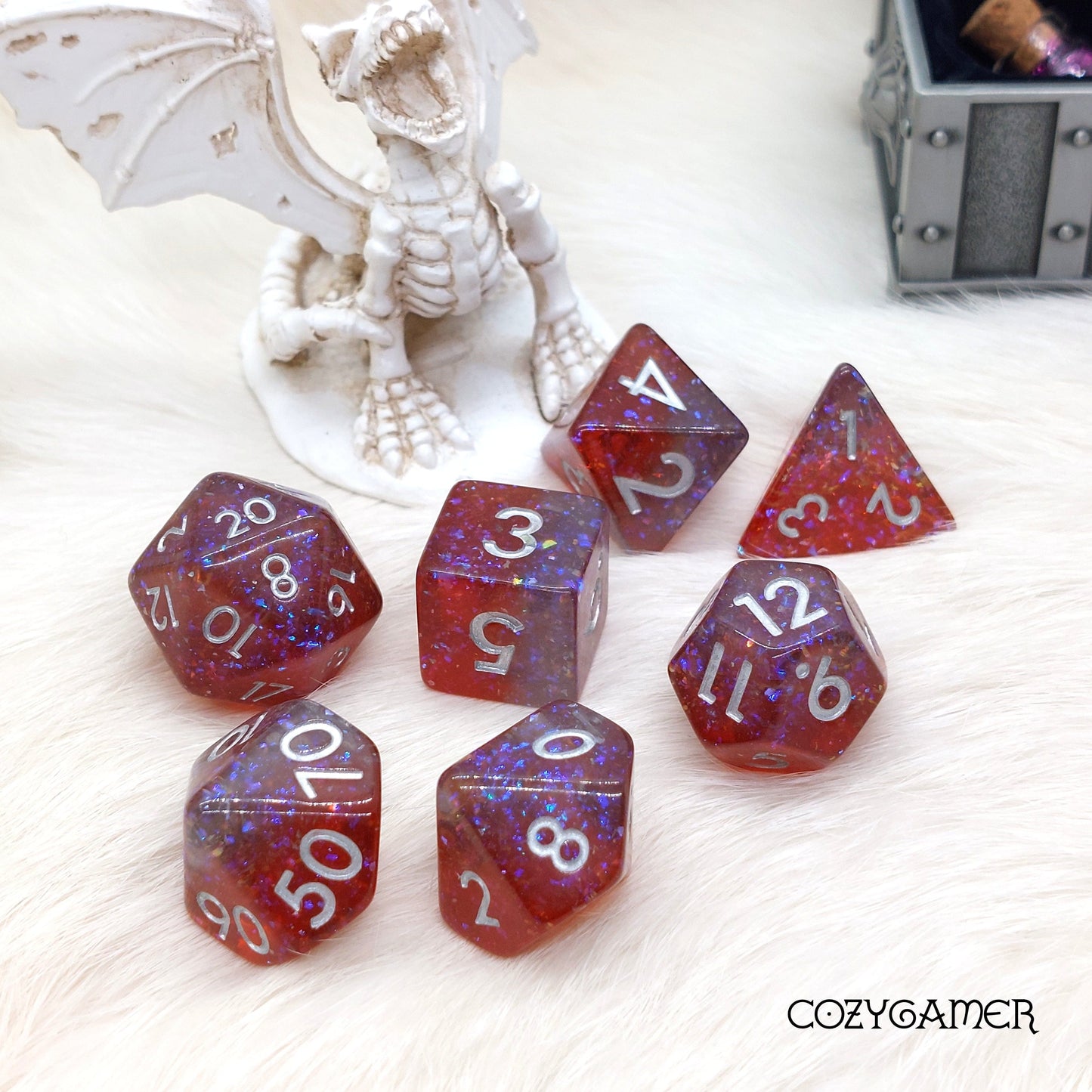 Fiery Sparkle Dice Set with purple and red glitter, 7-piece polyhedral set for Dungeons and Dragons tabletop games.