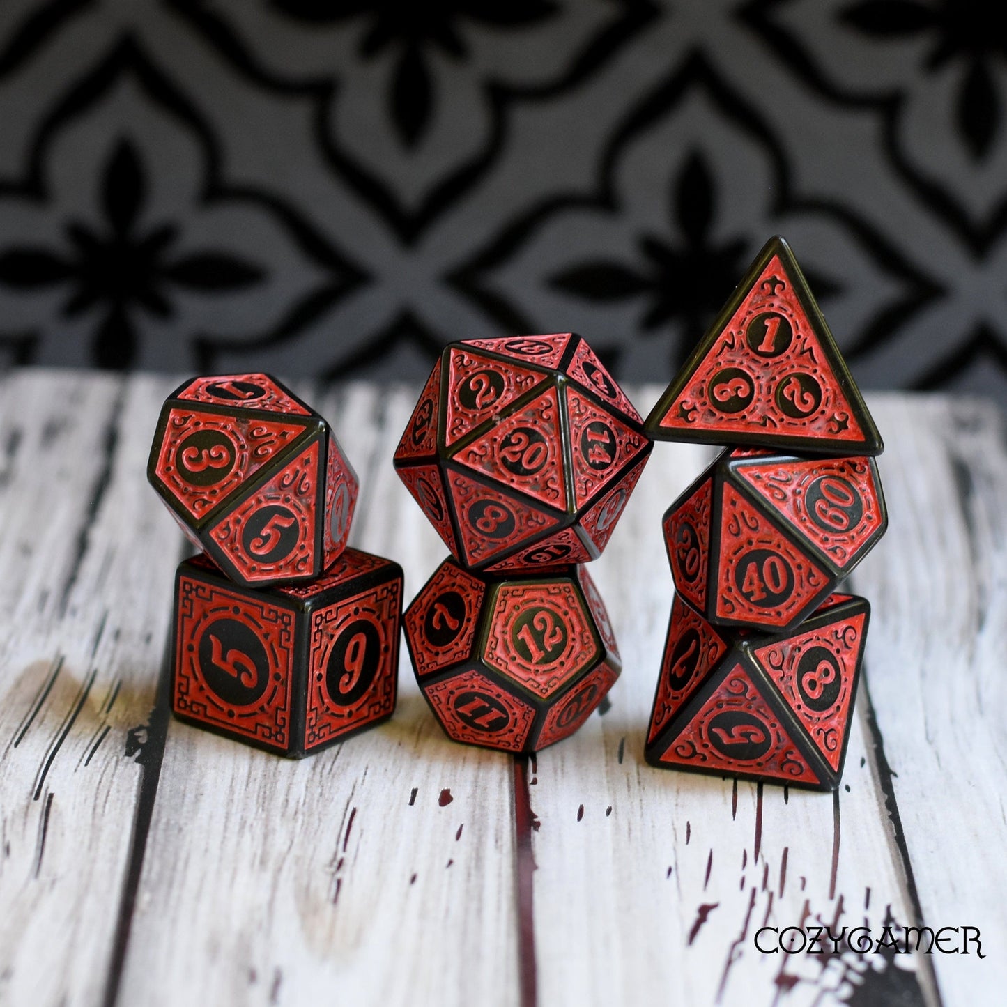 Elegant filigree framed 7-piece polyhedral dice set for TTRPGs like Dungeons and Dragons and Magic The Gathering.