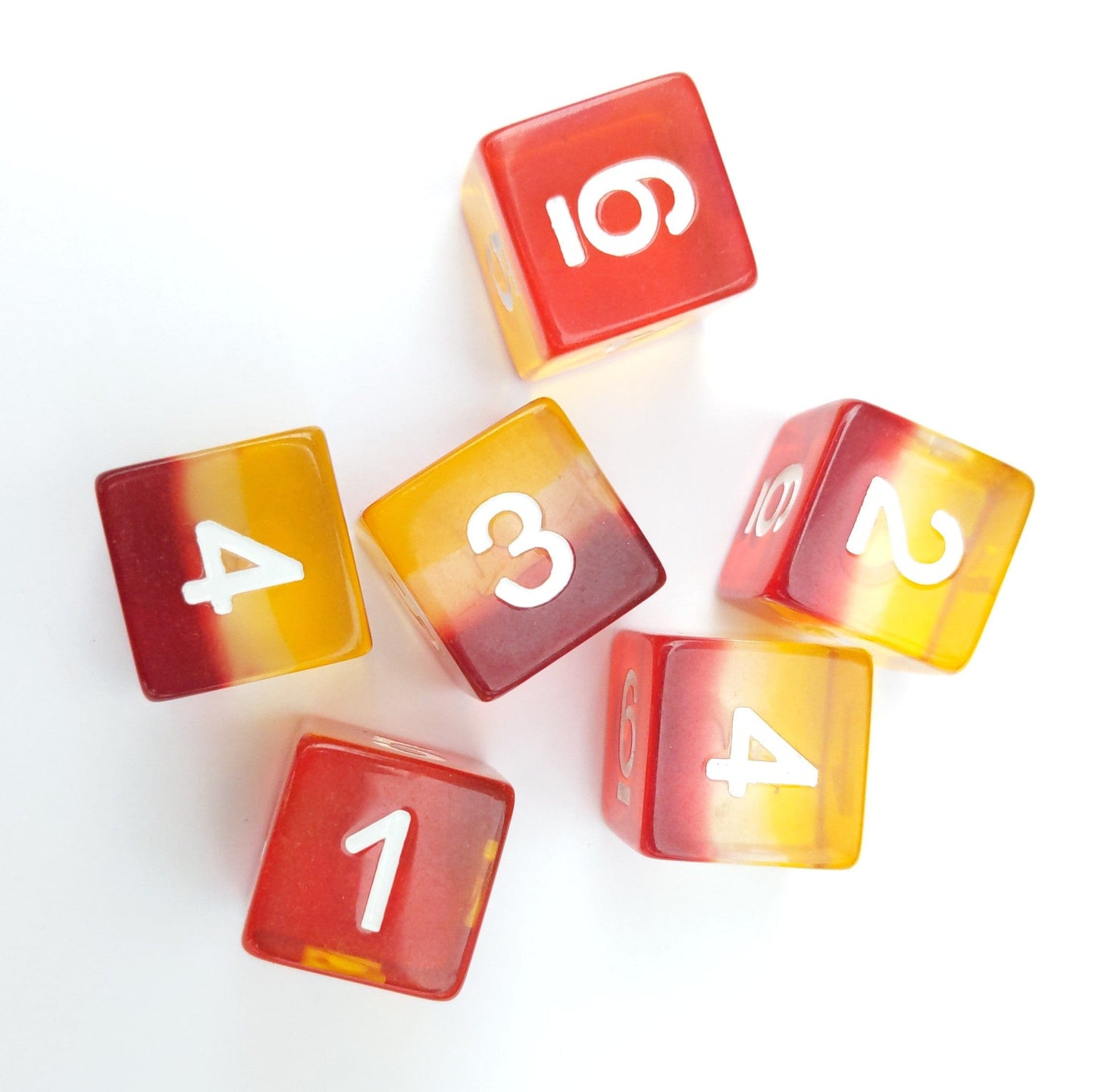 Fire Light D6 dice set of 6, clear resin with layered red, clear, and yellow colors, for tabletop RPGs and board games.