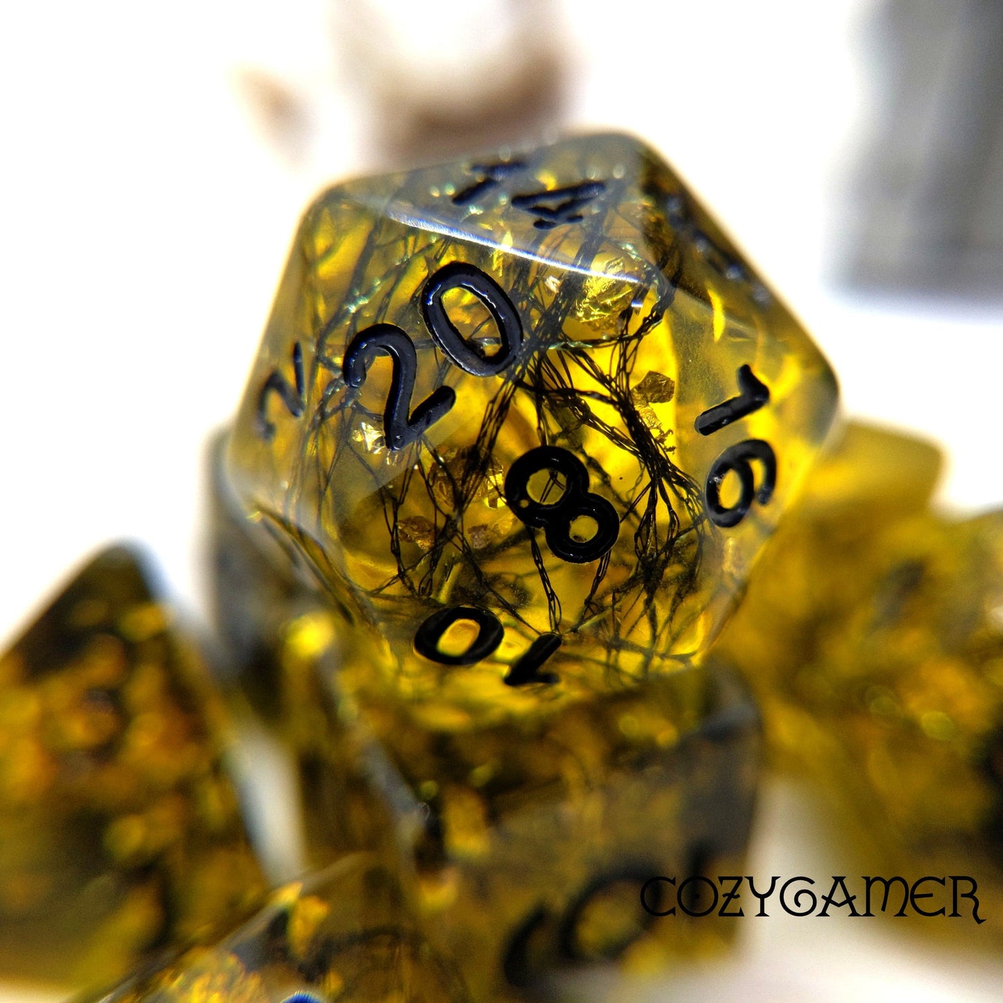 Gilded Web Dice Set. 7 Piece Black shimmering threads and gold foil