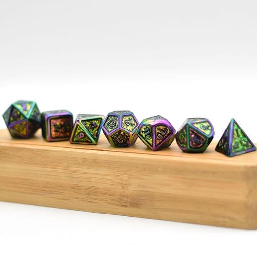 Color Shift Metal Dice Set with Rainbow Trim showing glittering magenta and green hues for tabletop role-playing games.