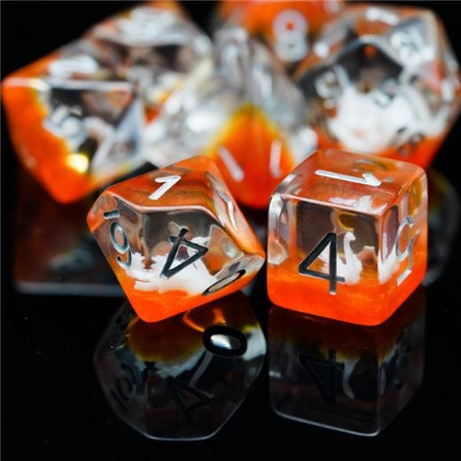 Golden Swan Lake Dice Set with white swan miniature in resin, TTRPG 7 piece polyhedral dice for DnD on black background.