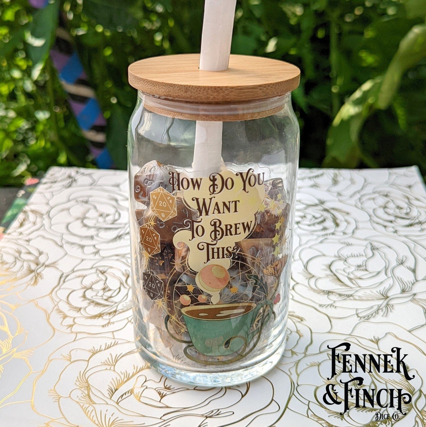"How Do You Want To Brew This? Vinyl sticker on a glass jar with dice, coffee-themed Dungeons and Dragons design by Fennek & Finch."
