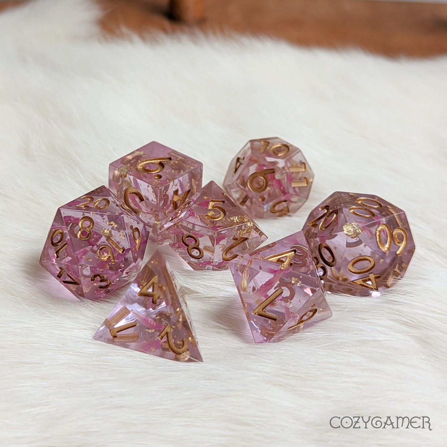 Immortal Love sharp edge mauve resin dice set with petals and metal foil, perfect for 7 piece DND and TTRPG games.