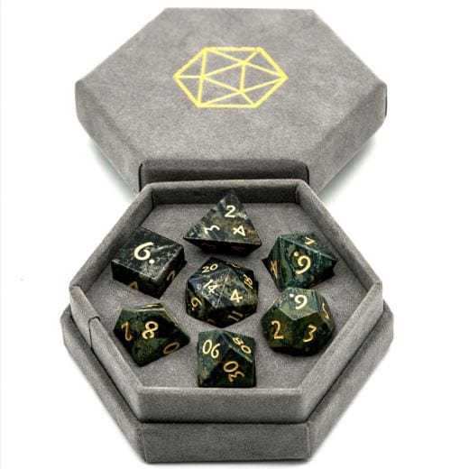 Kambaba Jasper Dice Set in hexagonal box, semi-precious 7-piece TTRPG dice set with engraved numbers, perfect for tabletop gaming.