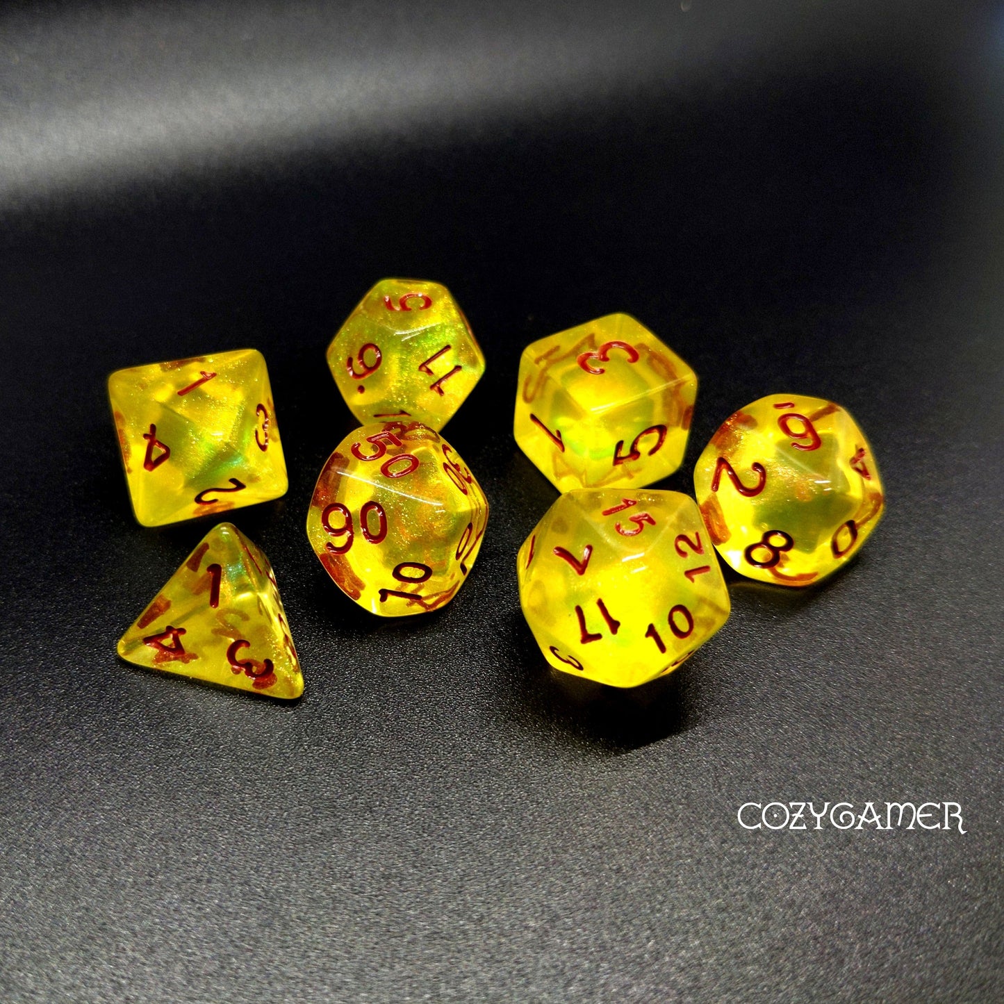 Lemon Yellow Will O Wisp dice set with red font, perfect for Dungeons and Dragons, 7-piece TTRPG polyhedral dice set.