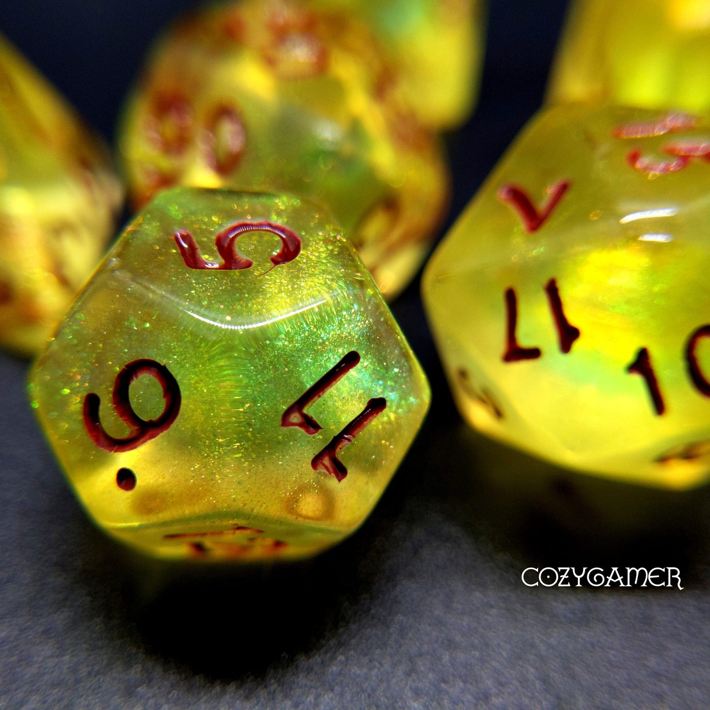 Lemon Yellow Will O Wisp Dice Set with red numbers and shimmering design, perfect for Dungeons and Dragons and tabletop RPGs.