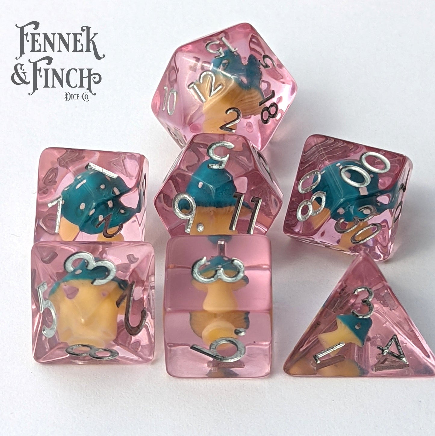 Magic Mushroom Dice Set featuring tiny blue Amanita mushrooms in clear resin for tabletop games.