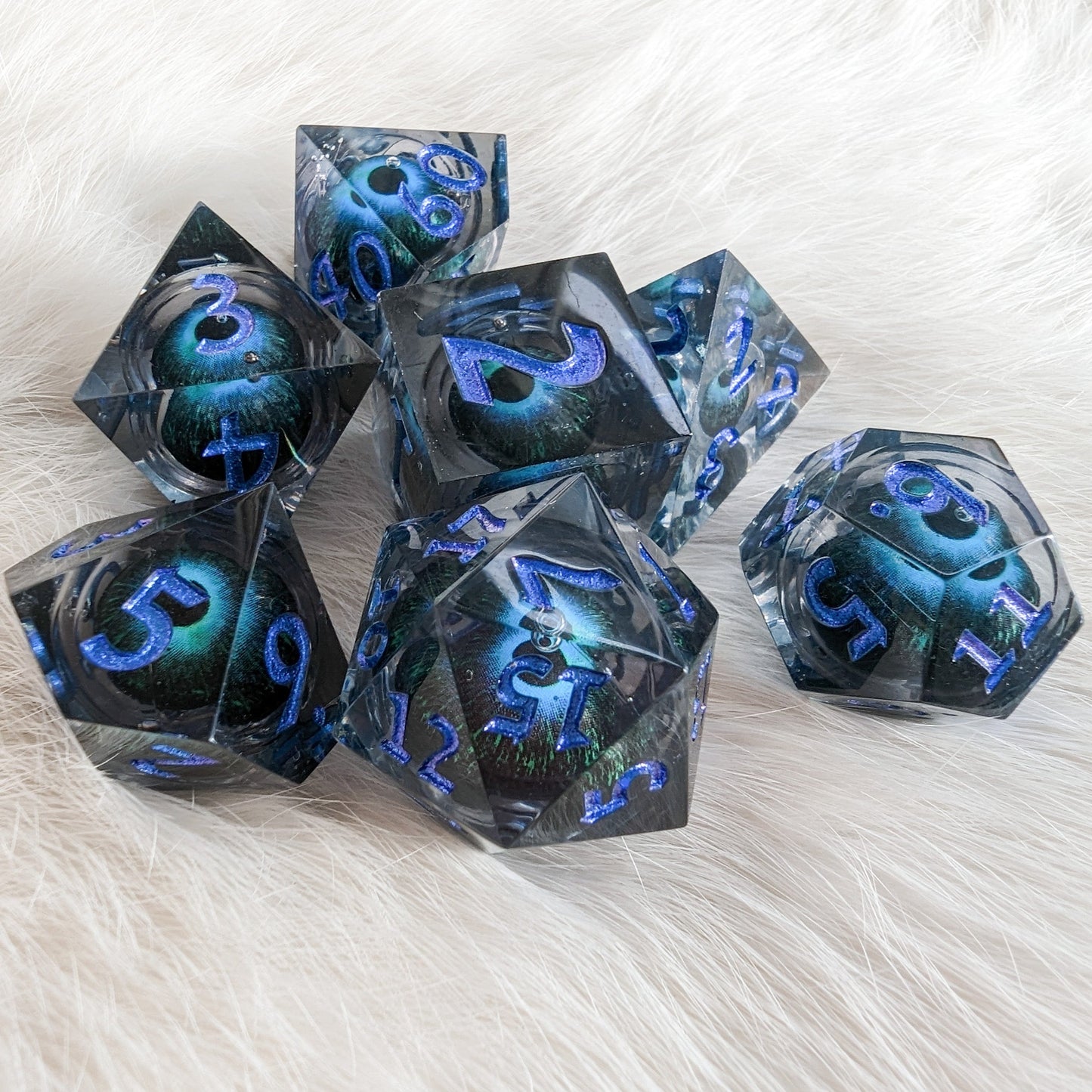 Moving Eye Liquid Core Sharp Edge Resin DnD Dice Set Dice Sets & Games Fennek and Finch
