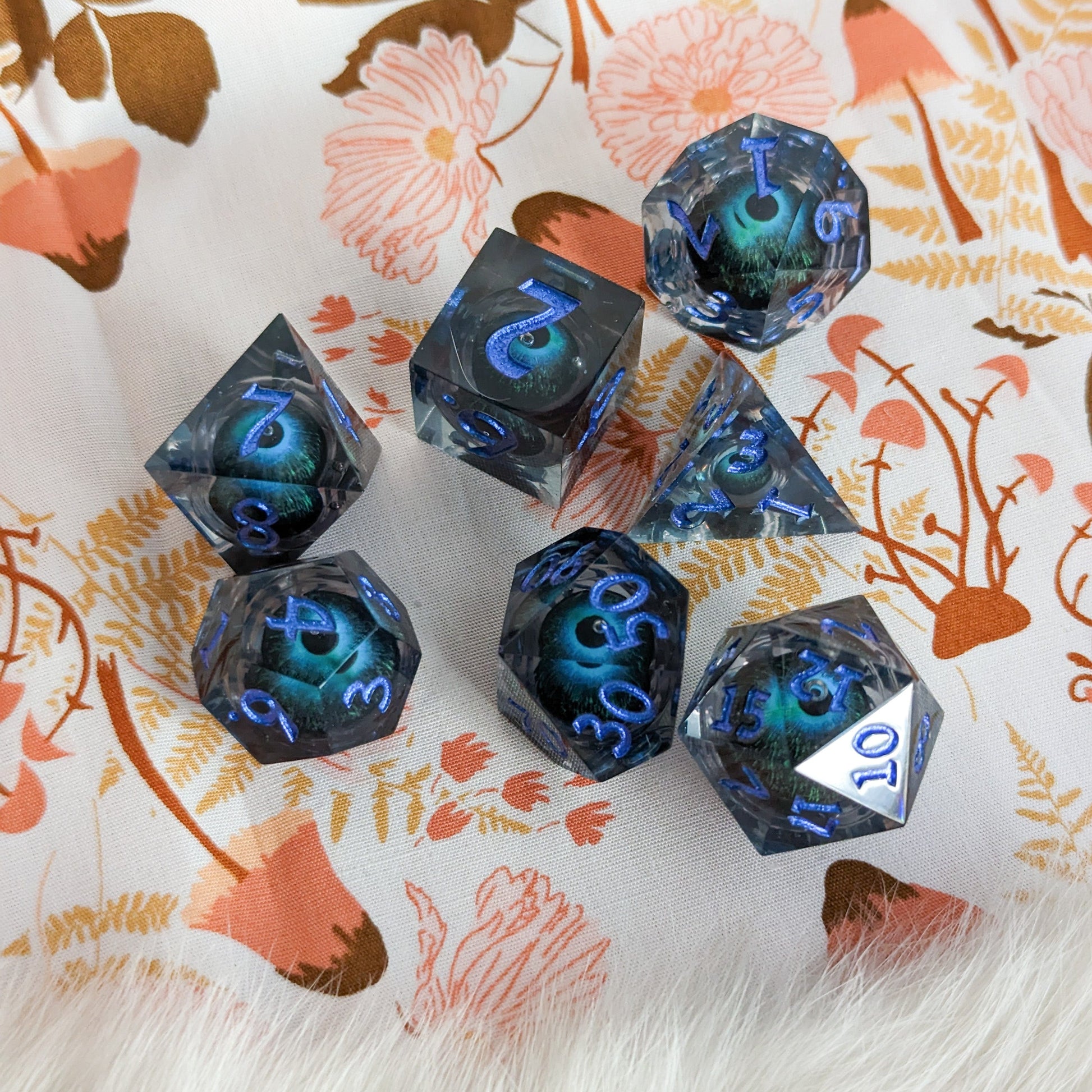 Moving Eye Liquid Core Sharp Edge Resin DnD Dice Set Dice Sets & Games Fennek and Finch