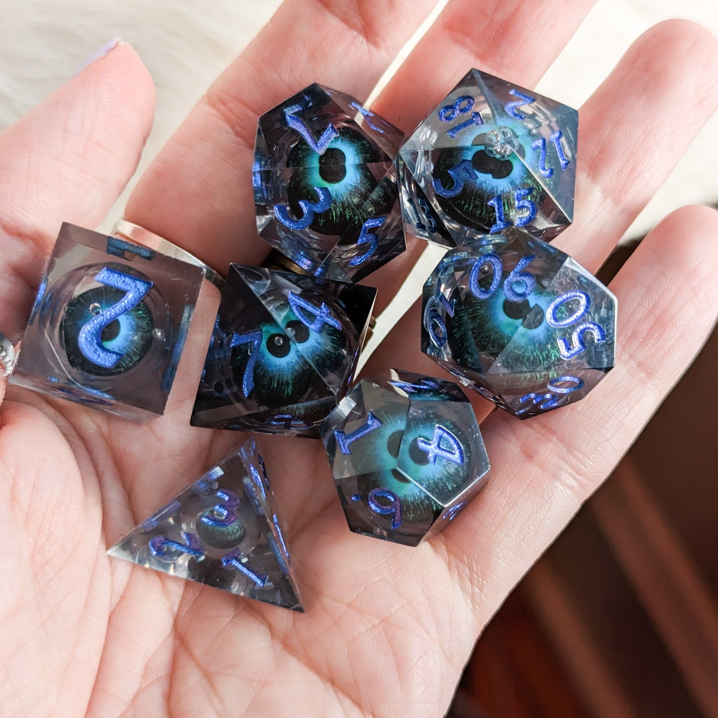 Moving Eye Liquid Core Sharp Edge Resin DnD Dice Set Dice Sets & Games Fennek and Finch