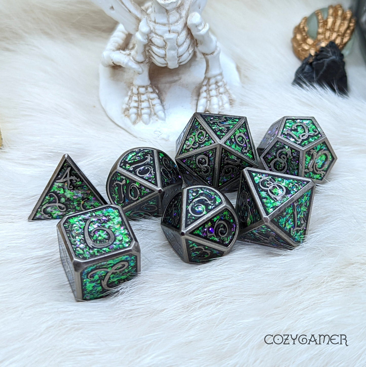 Nickel Cloud Dragon DnD dice set with purple and green glittery faces and nickel borders, ideal for fantasy tabletop games.
